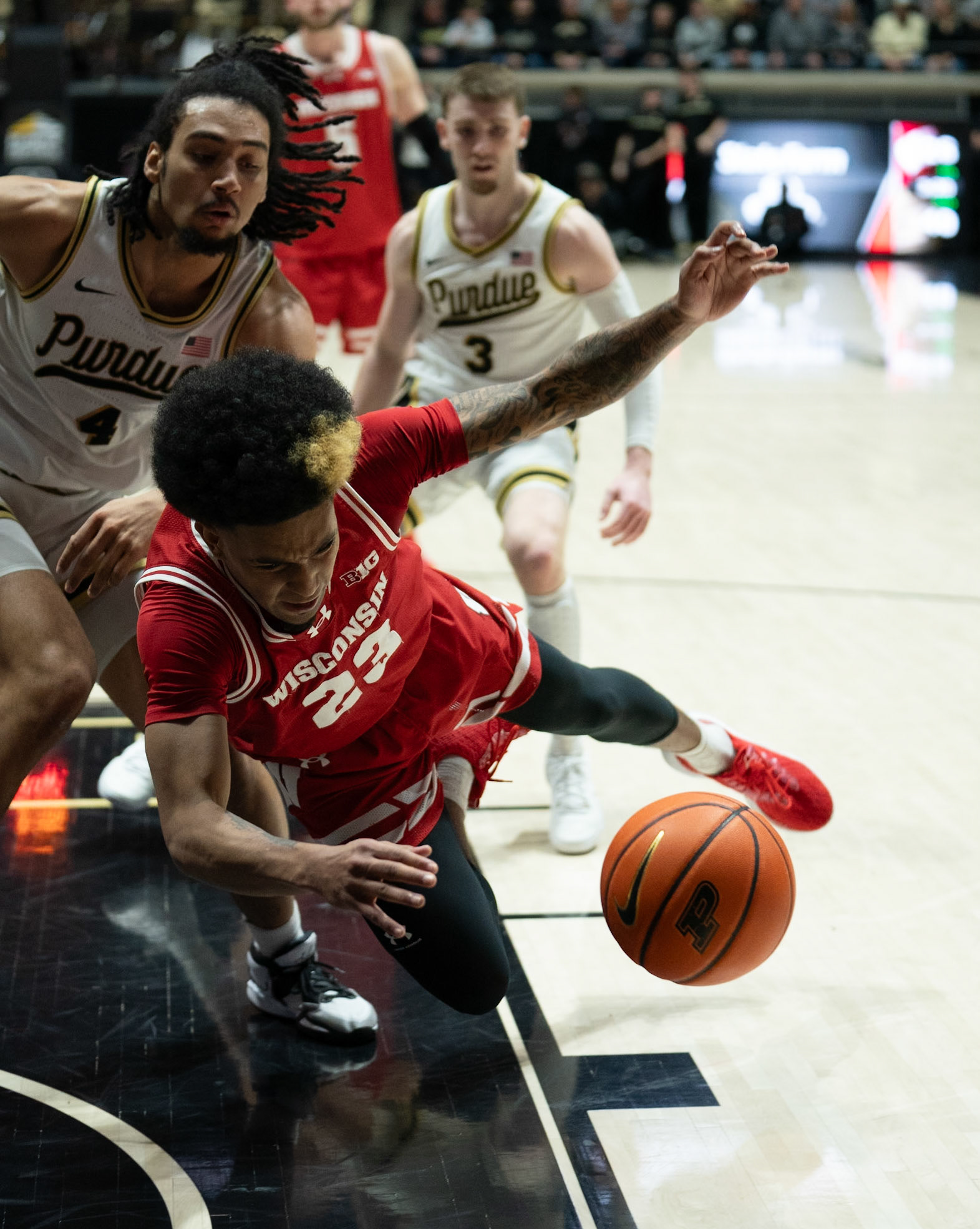 WEST LAFAYETTE, IN - MARCH 10, 2024: Wisconsin Junior Guard Chucky Hepburn (23), Purdue Sophomore Forward Trey Kaufman-Renn (4) competing in Purdue University Boilermaker Basketball vs University of Wisconsin Badgers at Mackey Arena(Photo by Steve Bowen / Bowen Arrow Photography / Northern Indiana Sports Report)