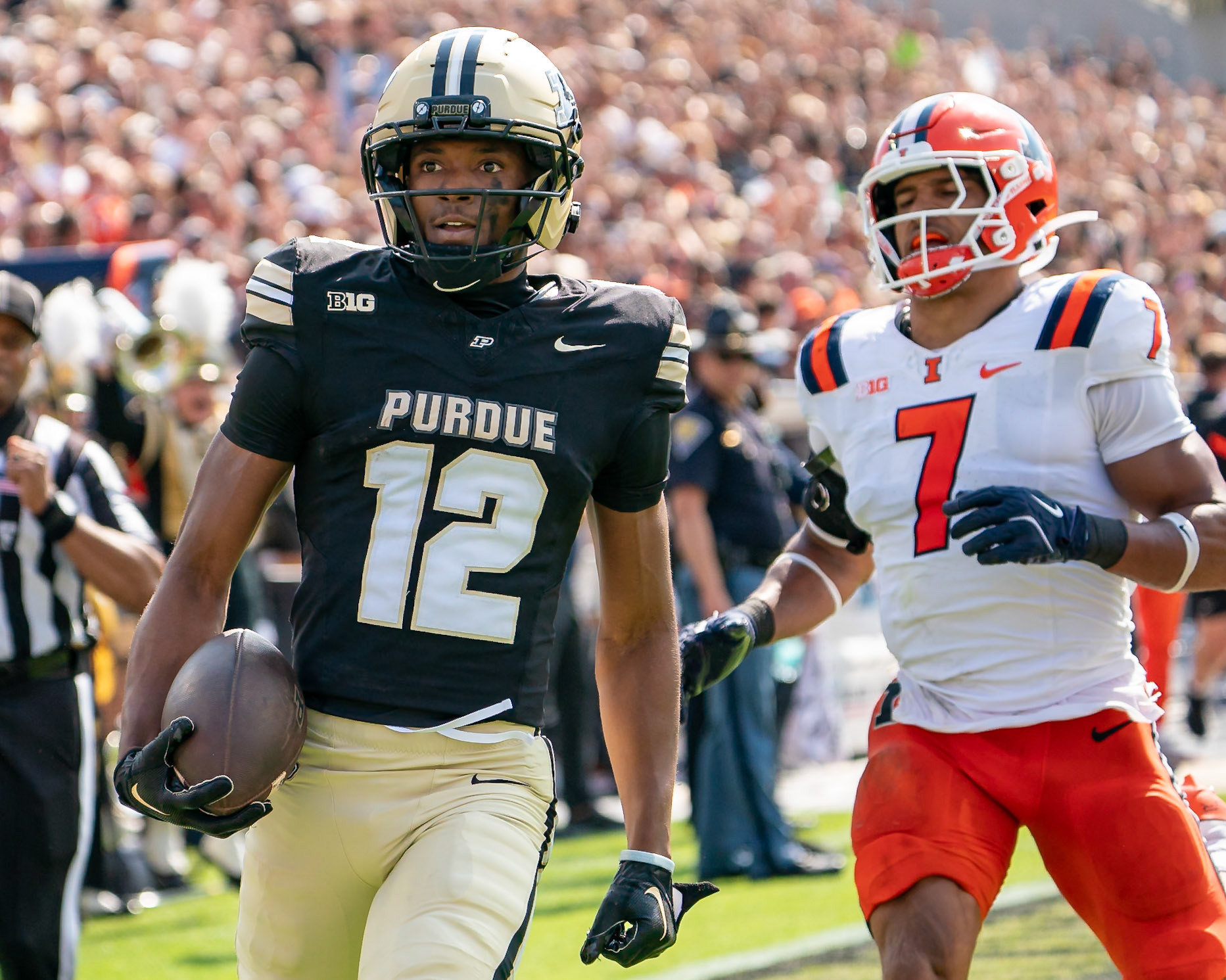 WEST LAFAYETTE, IN - OCTOBER 4, 2025: Purdue University Sophomore Wide Receiver Corey Smith (12) scores a touchdown as University of Illinois’ Senior WR Alexander Capka-Jones (7) cannot catch him during the Purdue Boilermaker Football vs University of Illinois Fighting Illini at Ross-Ade Stadium(Photo by Steve Bowen / Northern Indiana Sports Report)