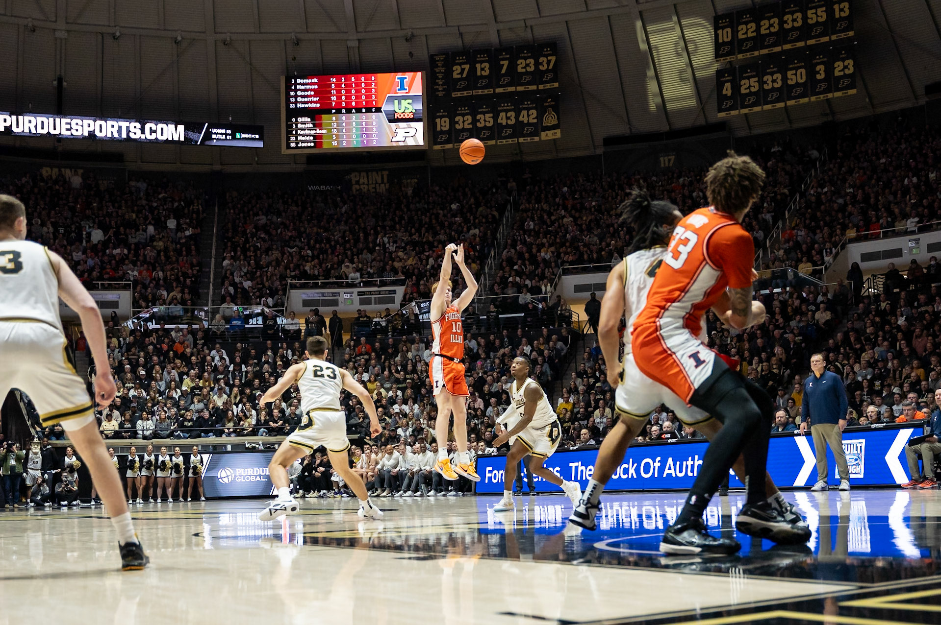 WEST LAFAYETTE, IN - JANUARY 5, 2024: Illinois Junior Guard/Forward Luke Goode (10) pulling up for a three as Purdue 5th year Guard Lance Jones (55) and Purdue Redshirt Freshman Forward Camden Heide (23) look on in Purdue Boilermaker's Basketball vs the Illinois Fighting Illini at Mackey Arena(Photo by Steve Bowen / Bowen Arrow Photography / Northern Indiana Sports Report)
