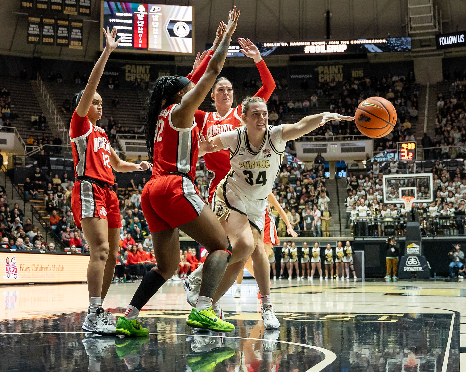 WEST LAFAYETTE, IN - JANUARY 28, 2024: Purdue 6th Year Forward Caitlyn Harper (34), Ohio State Guard Graduate Celeste Taylor (12), Ohio State Forward Graduate Rebeka Mikulášiková (23), Ohio State Forward Sophomore Cotie McMahon (32) competing in Purdue Boilermaker Women's Basketball versus the Ohio State Buckeyes at Mackey Arena(Photo by Steve Bowen / Bowen Arrow Photography / Northern Indiana Sports Report)