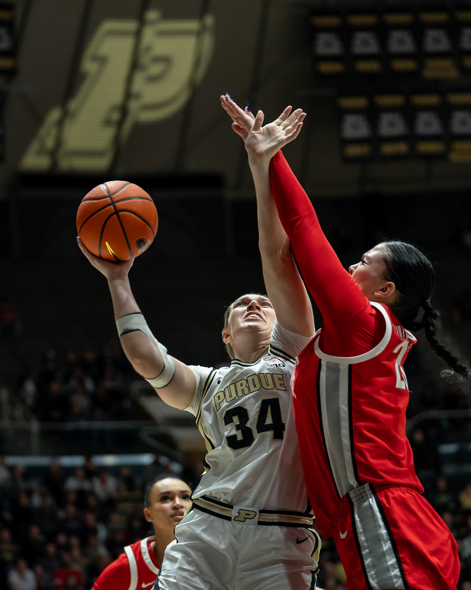 WEST LAFAYETTE, IN - JANUARY 28, 2024: Purdue 6th Year Forward Caitlyn Harper (34), Ohio State Forward Graduate Rebeka Mikulášiková (23) competing in Purdue Boilermaker Women's Basketball versus the Ohio State Buckeyes at Mackey Arena(Photo by Steve Bowen / Bowen Arrow Photography / Northern Indiana Sports Report)