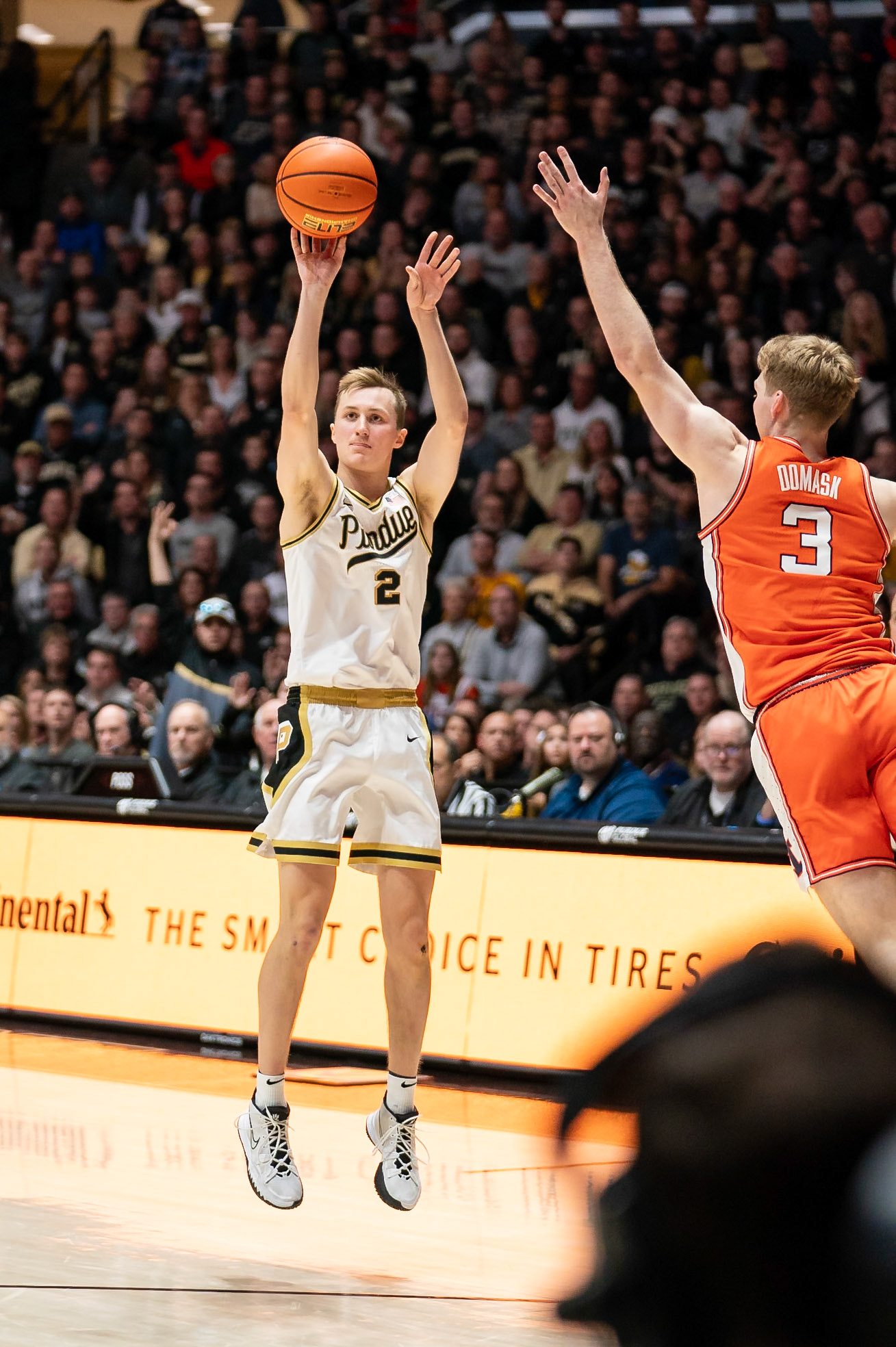WEST LAFAYETTE, IN - JANUARY 5, 2024: Purdue Sophomore Guard Fletcher Loyer (2) putting up a three point shot while Illinois Graduate Guard/Forward Marcus Domask (3) goes to block him in Purdue Boilermaker's Basketball vs the Illinois Fighting Illini at Mackey Arena(Photo by Steve Bowen / Bowen Arrow Photography / Northern Indiana Sports Report)