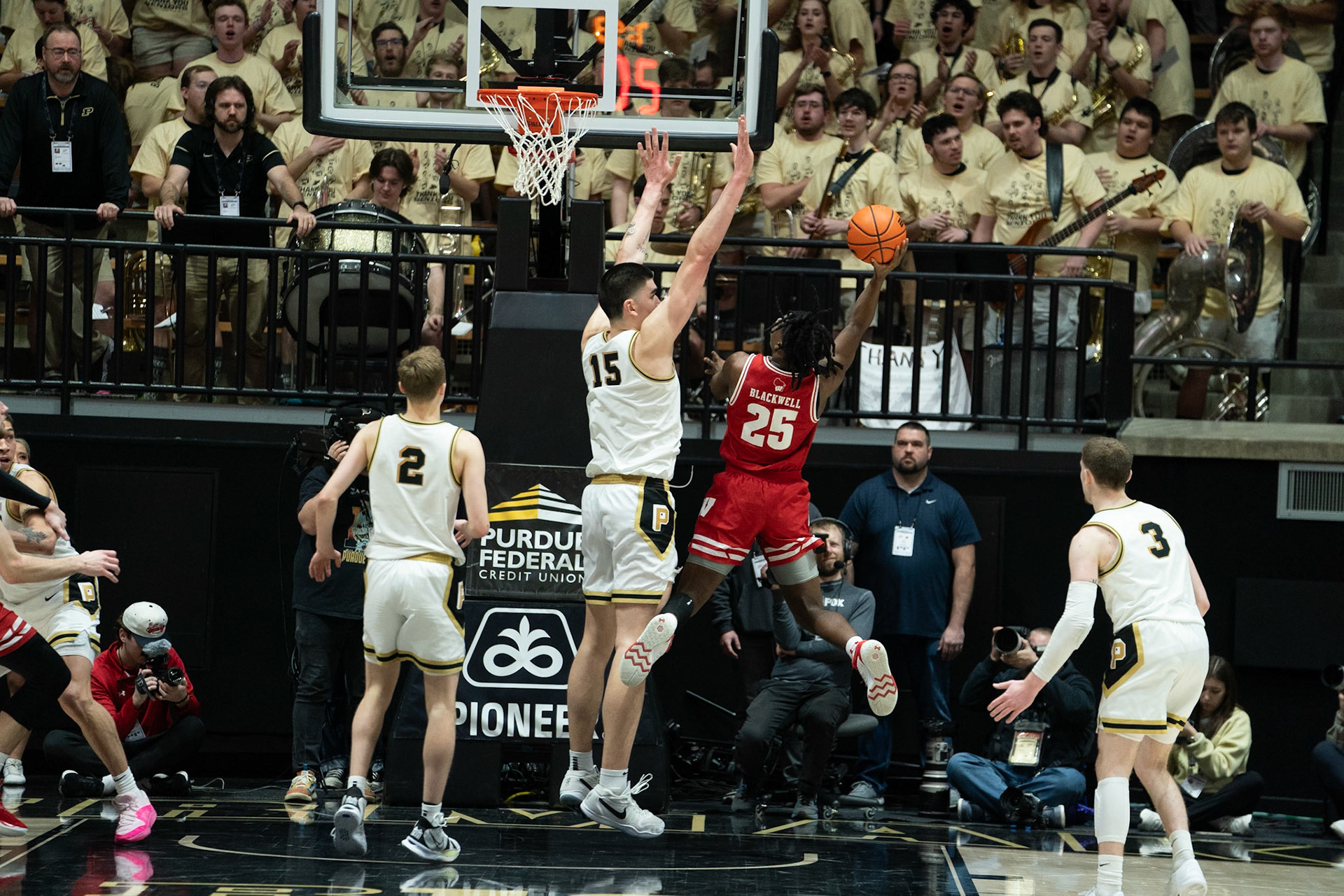 WEST LAFAYETTE, IN - MARCH 10, 2024: Wisconsin Freshman Guard John Blackwell (25), Purdue Senior Center Zach Edey (15) in Purdue University Boilermaker Basketball vs University of Wisconsin Badgers at Mackey Arena(Photo by Steve Bowen / Bowen Arrow Photography / Northern Indiana Sports Report)