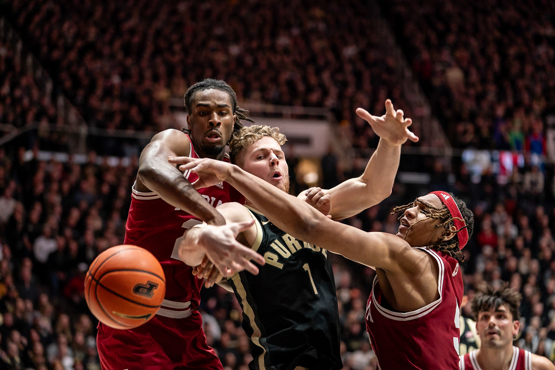 WEST LAFAYETTE, IN - FEBRUARY 10, 2024: Purdue Junior Forward Caleb Furst (1), Indiana Sophomore Forward Malik Reneau (5), Indiana Freshman Forward Mackenzie Mgbako (21) in Purdue Boilermaker vs Indiana Hoosiers Basketball at Mackey Arena(Photo by Steve Bowen / Bowen Arrow Photography / Northern Indiana Sports Report)