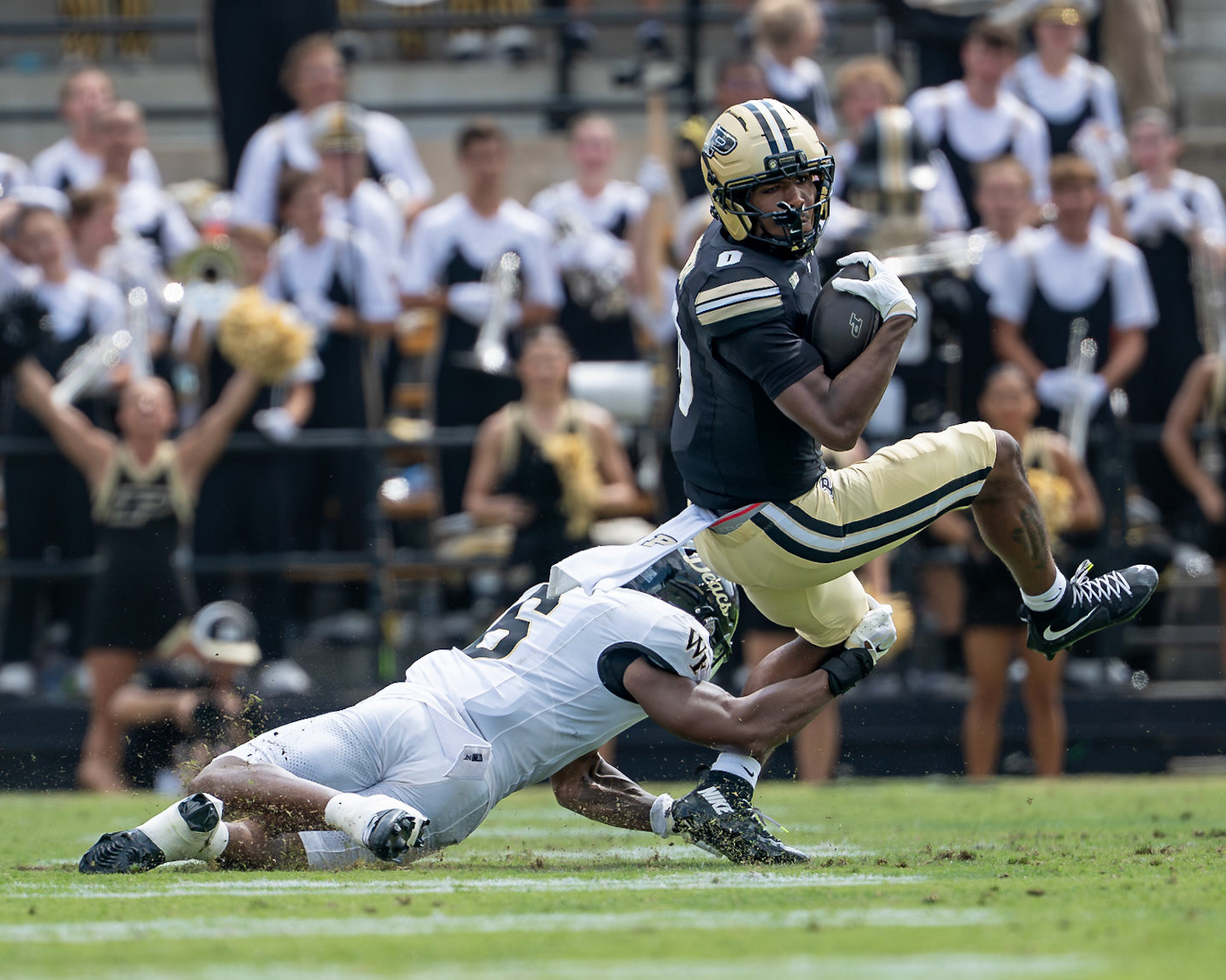 WEST LAFAYETTE, IN - SEPTEMBER 12, 2026: Purdue University Sophomore Wide Receiver Jaylan Hornsby (0) spins out of the grasp of Wake Forest University Defensive Back Rushaun Tongue (6) during the Purdue Boilermakers football game vs the Wake Forest Demon Deacons at Ross-Ade Stadium(Photo by Steve Bowen / Northern Indiana Sports Report)