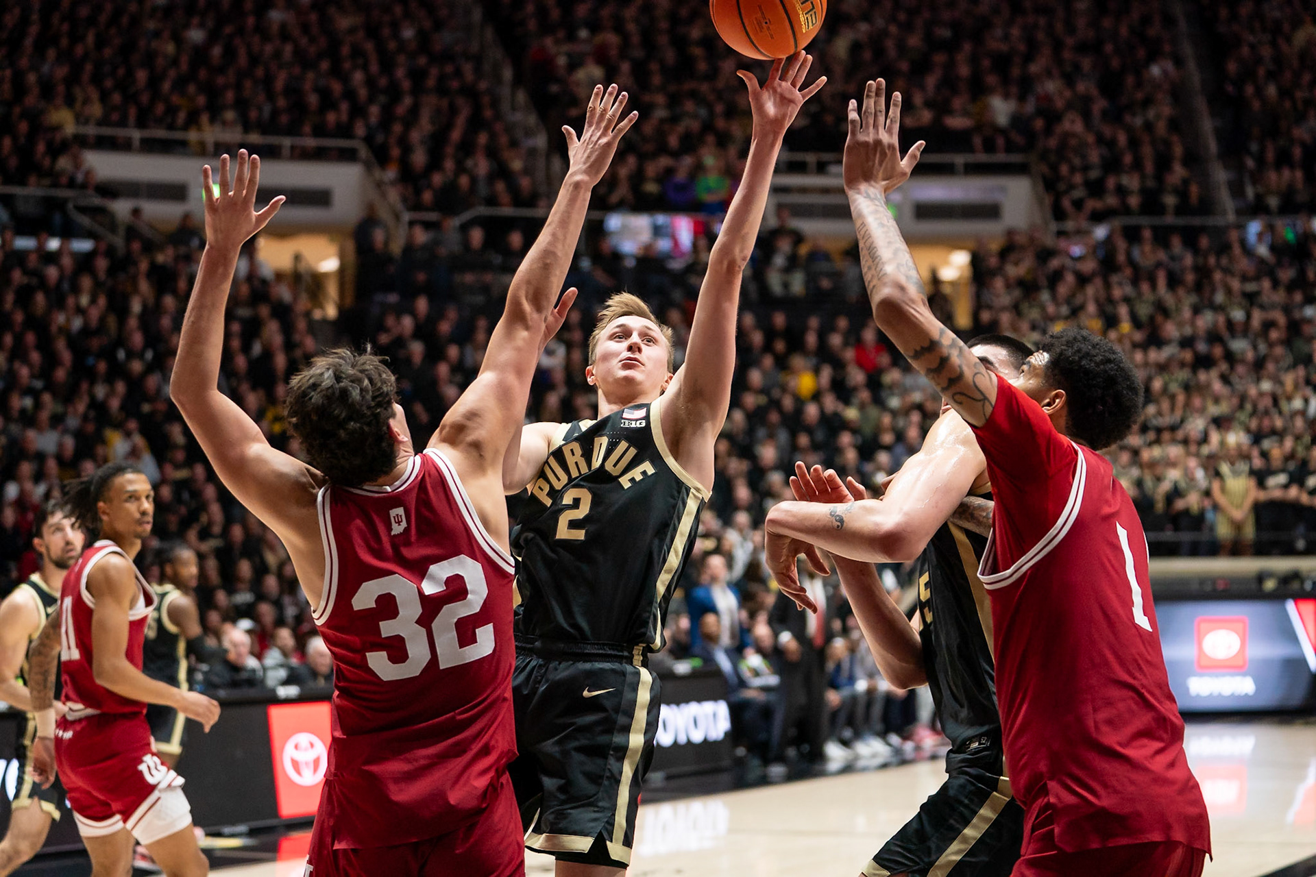 WEST LAFAYETTE, IN - FEBRUARY 10, 2024: Purdue Sophomore Guard Fletcher Loyer (2), Indiana Senior Guard Trey Galloway (32), Indiana Sophomore Center Kel'el Ware (1) in Purdue Boilermaker vs Indiana Hoosiers Basketball at Mackey Arena(Photo by Steve Bowen / Bowen Arrow Photography / Northern Indiana Sports Report)