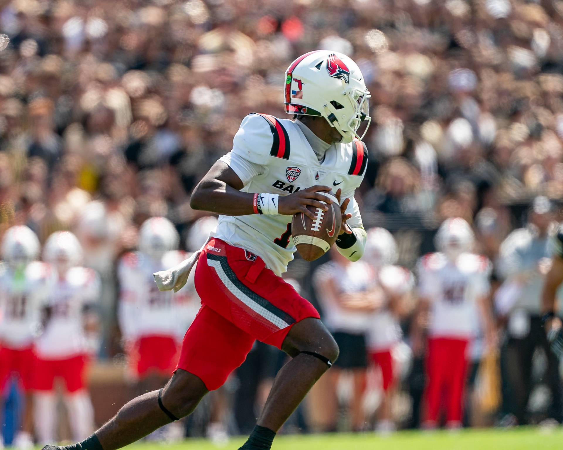 WEST LAFAYETTE, IN - AUGUST 30, 2025: Ball State University R-Sr. QB Kiael Kelly (1) rolling out to pass at Purdue Boilermaker Football vs Ball State Football at Ross-Ade Stadium(Photo by Steve Bowen / Northern Indiana Sports Report)