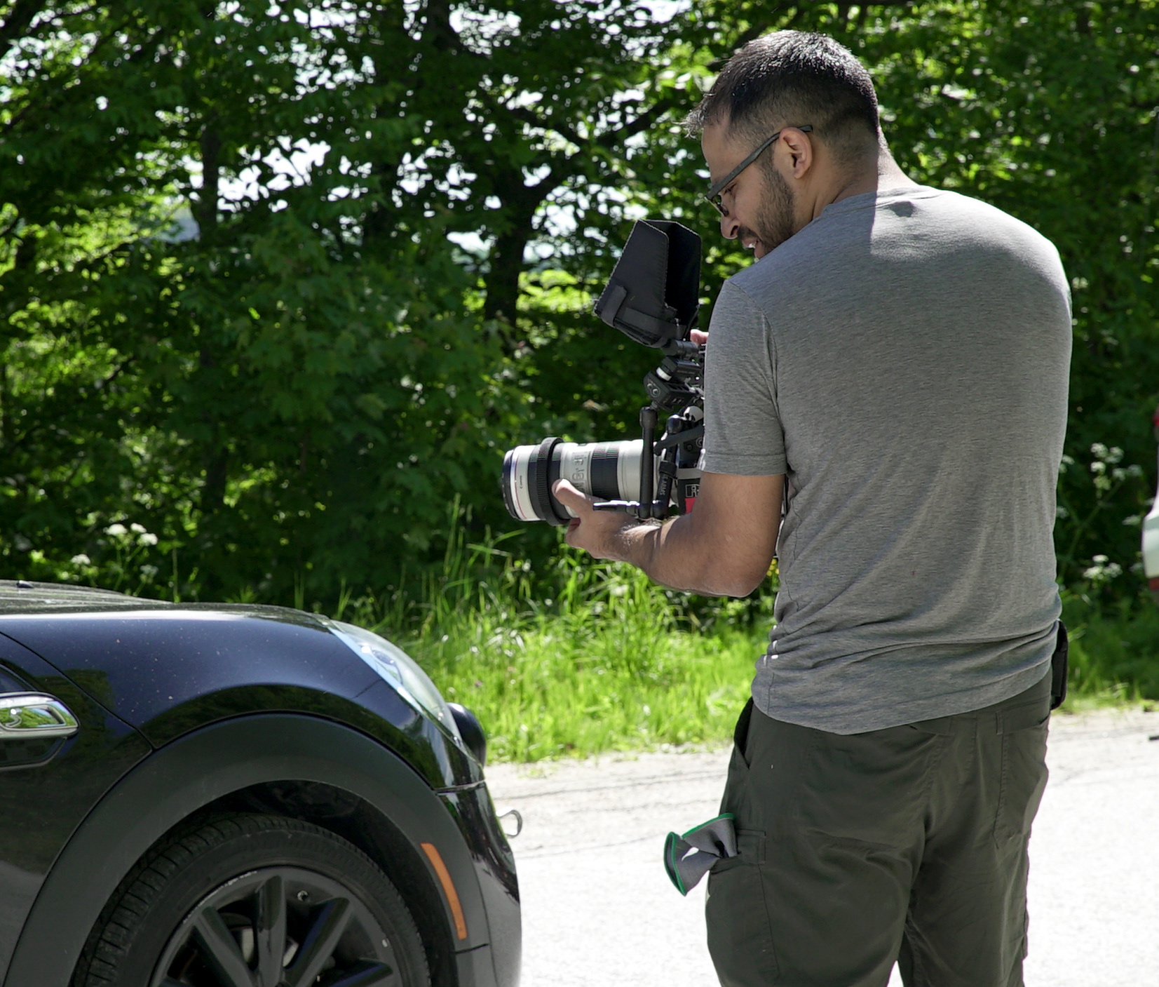 Dan trying to steal some tight shots of Emma in her Mini.