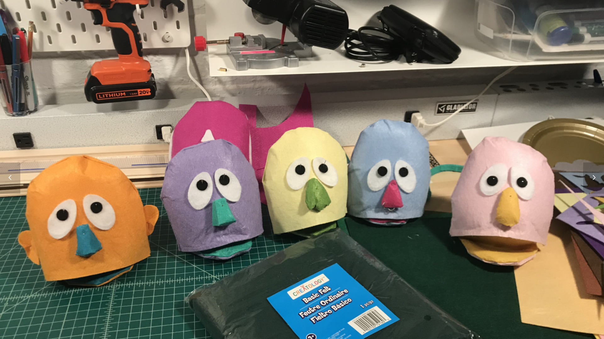All the puppets lined up for their hair and make up.