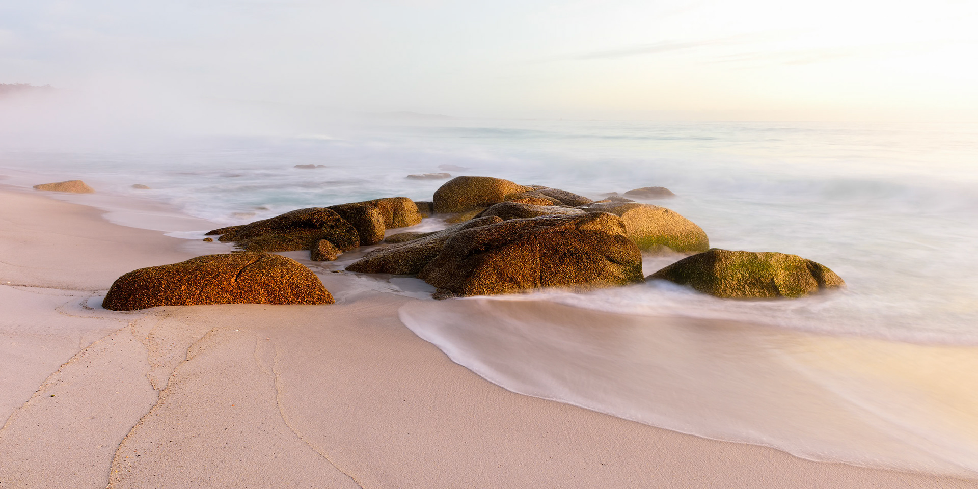 Soft Seamist / after a clear cool night at the Bay of Fires the warm water of the ocean rose in a thick sea mist which diffused the soft light at dawn.Tasmania, Australia