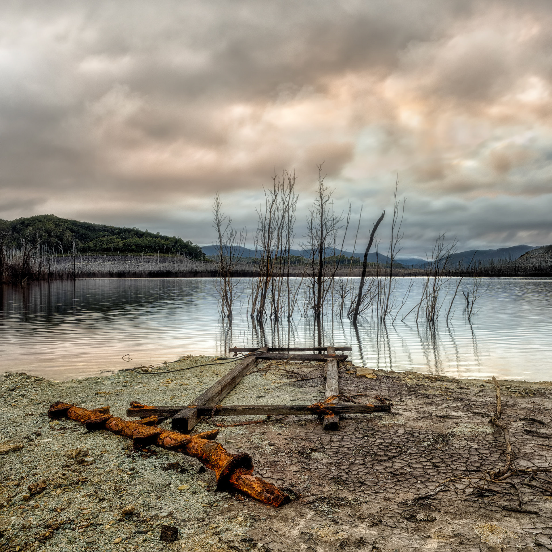 Rust / The drought of 2016 in Tasmania exposed the good and the bad when the levels of the dams dropped dramatically. Long submerged pieces of iron and steel soon started rusting. This shot was taken at Lake Gordon in South West National Park.