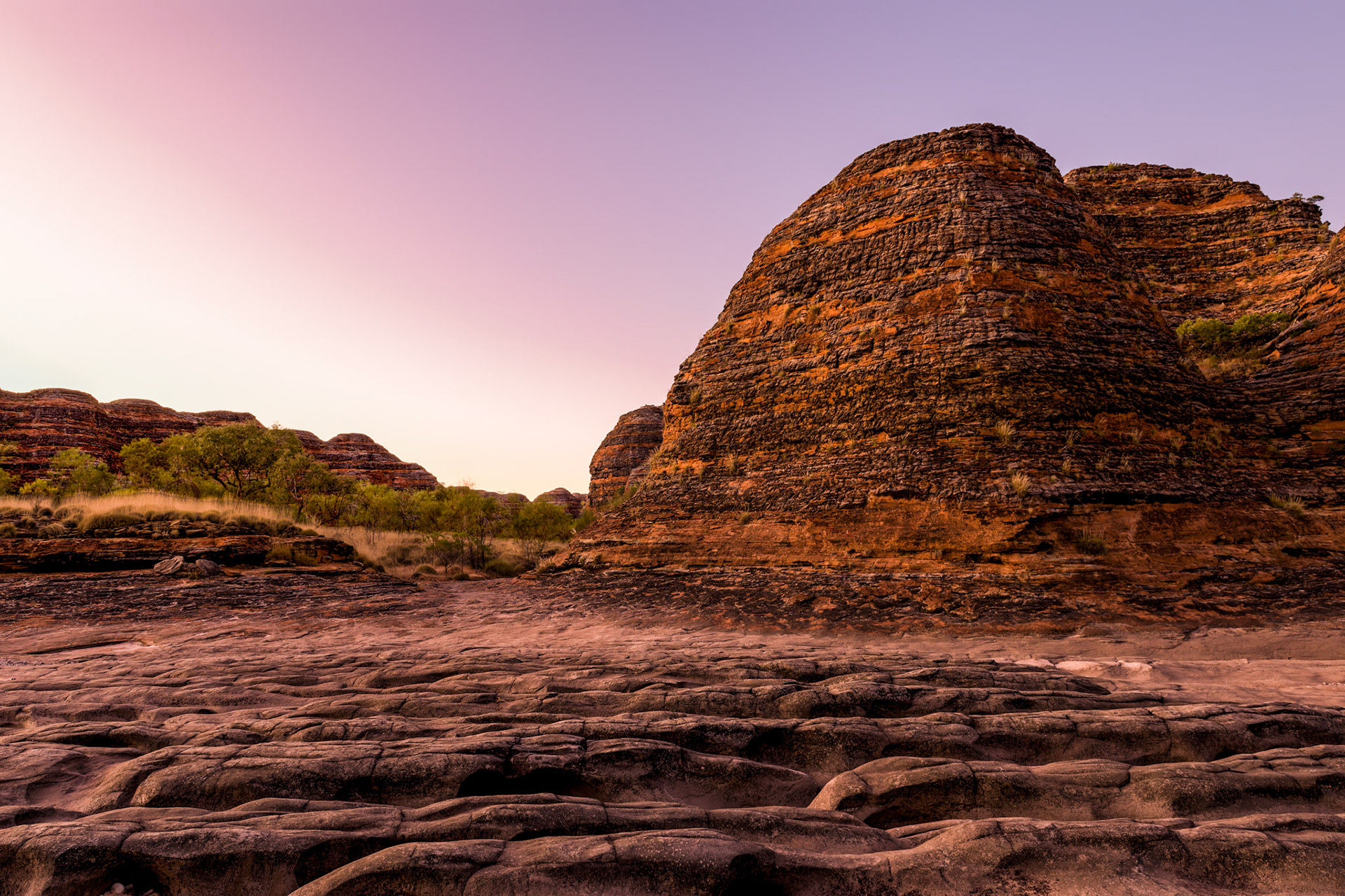 Long Time Dry / The contrast between the 'beehive' rocks and the ribbed creek bed is revealed in the light of dawn. Bungle Bungle Range, Purnululu National Park, Western Australia