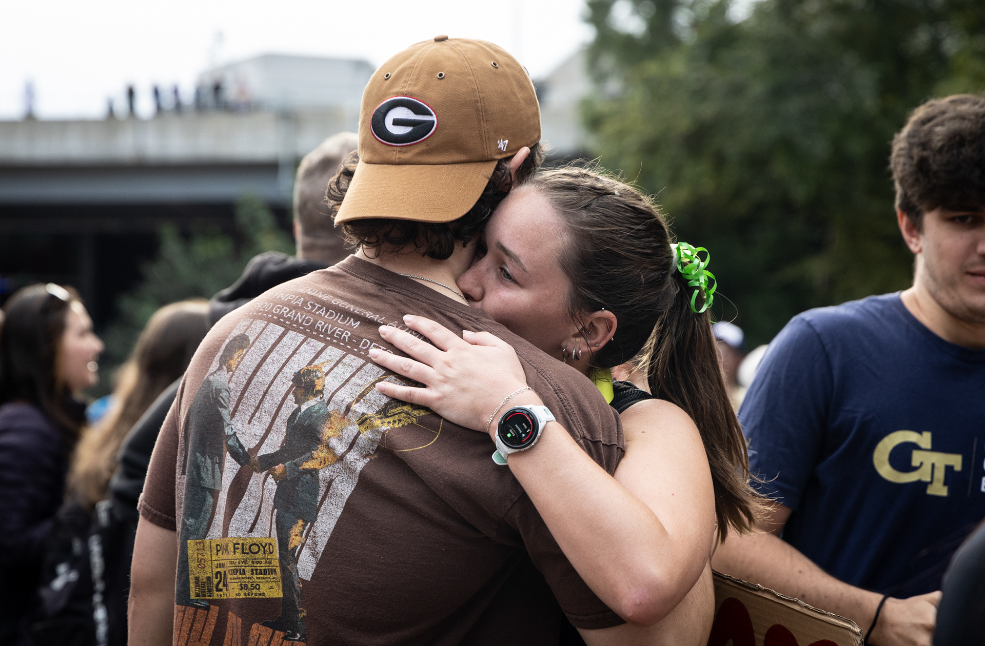 A runner celebrates after crossing the finish line at the AthHalf half marathon in Athens, Georgia on Sunday, Oct. 12, 2025. AthHalf is a fundraiser for Athfest Educates, which awards grants to schools, nonprofits and government agencies. (Photo/Emily Laycock)
