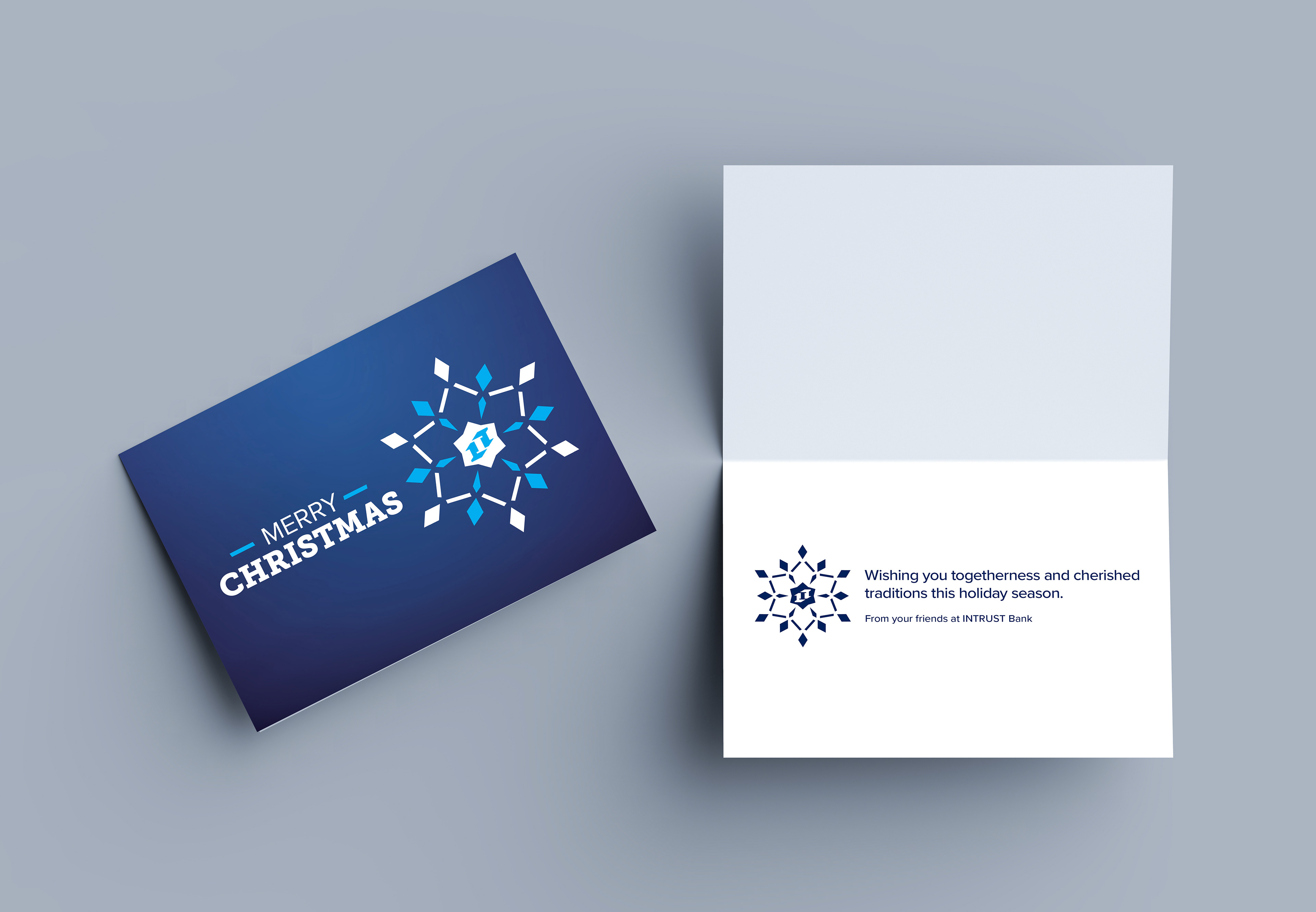Christmas 2022 card exterior printed four-color imprint with UV spot gloss and soft touch laminate. Single-color print interior.