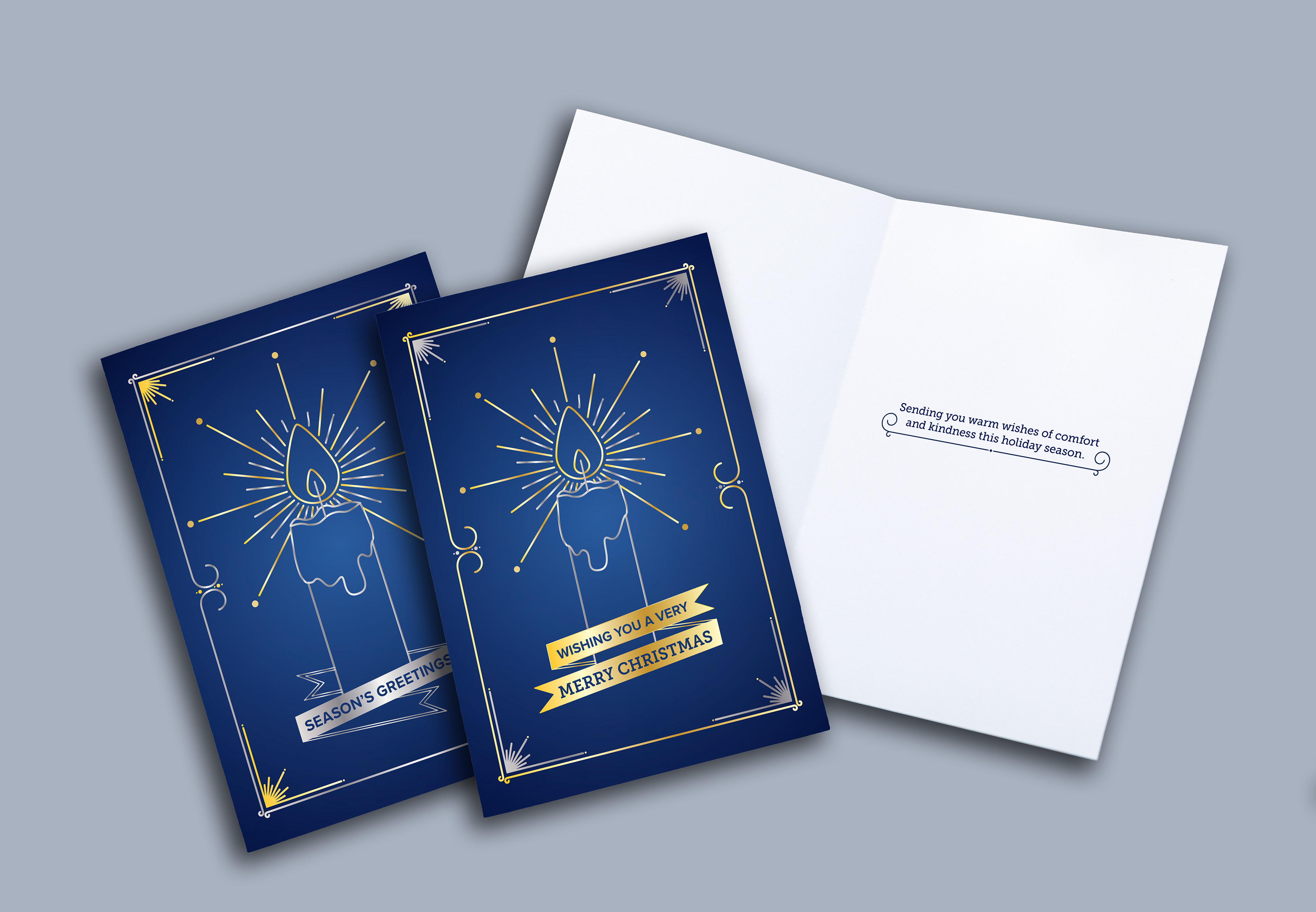 Holiday greeting cards 2023 - Silver and gold foil imprint over a four-print with the soft-touch laminate to prevent cracking over over the fold. Single color imprint interior.