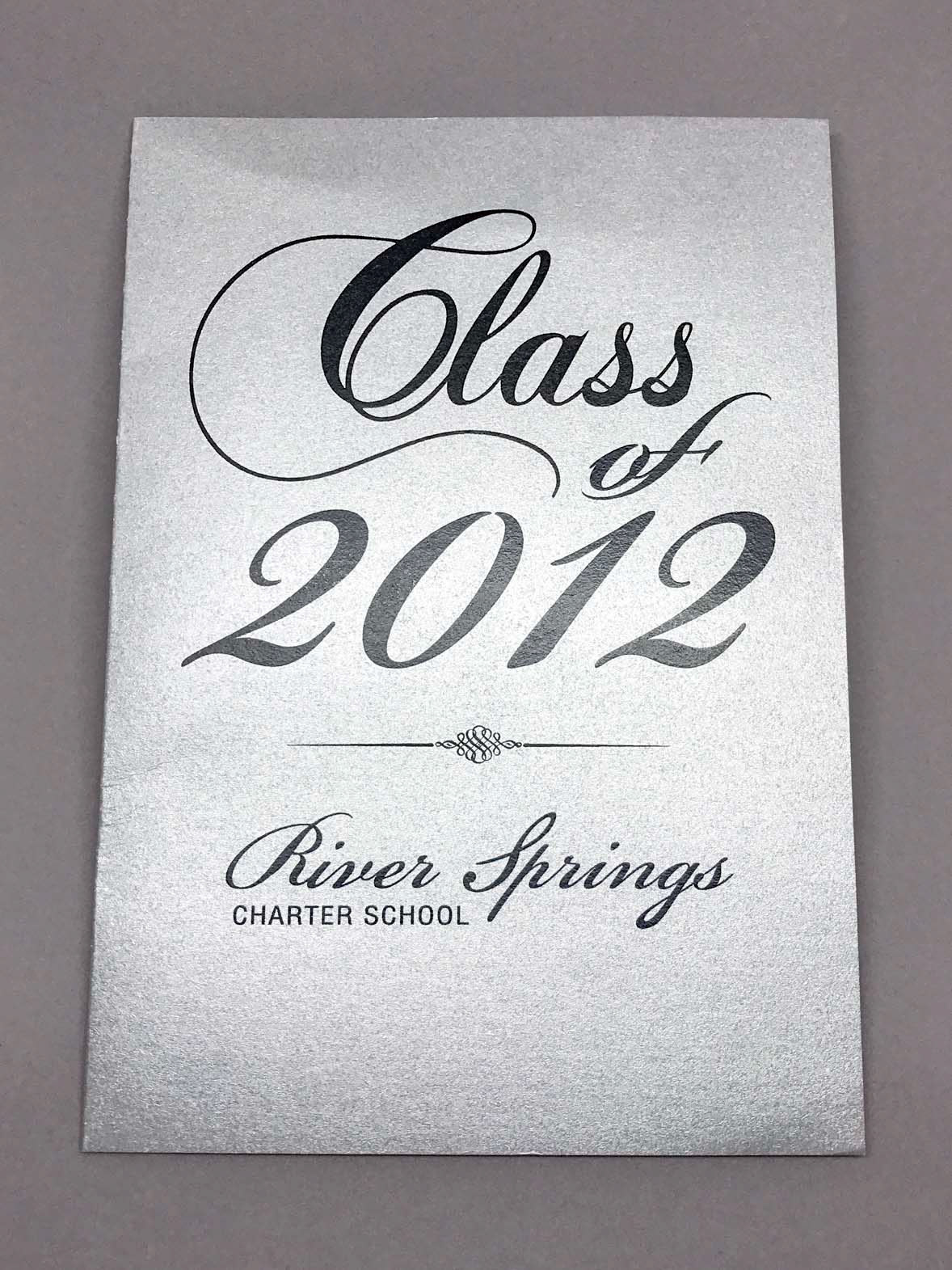 The client requested a custom high school graduation invitation that incorporated a photo and the mascot of the school.