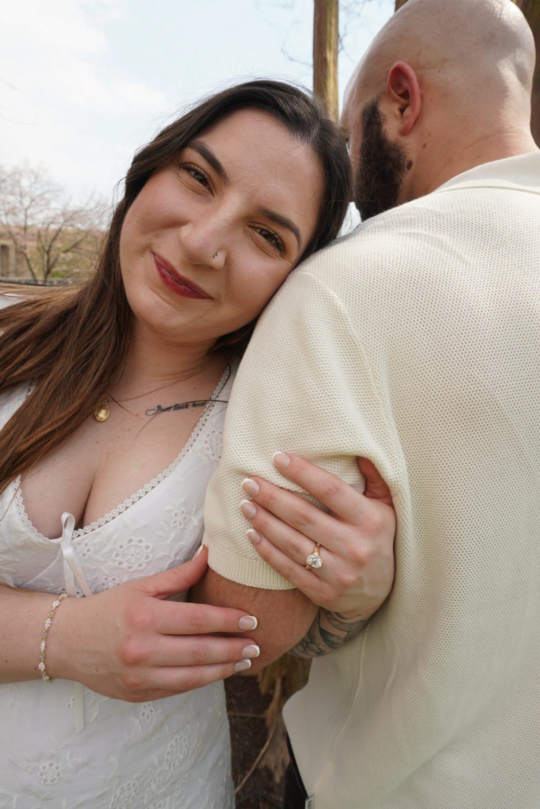 Couple embracing outdoors during a Nashville couples photography session