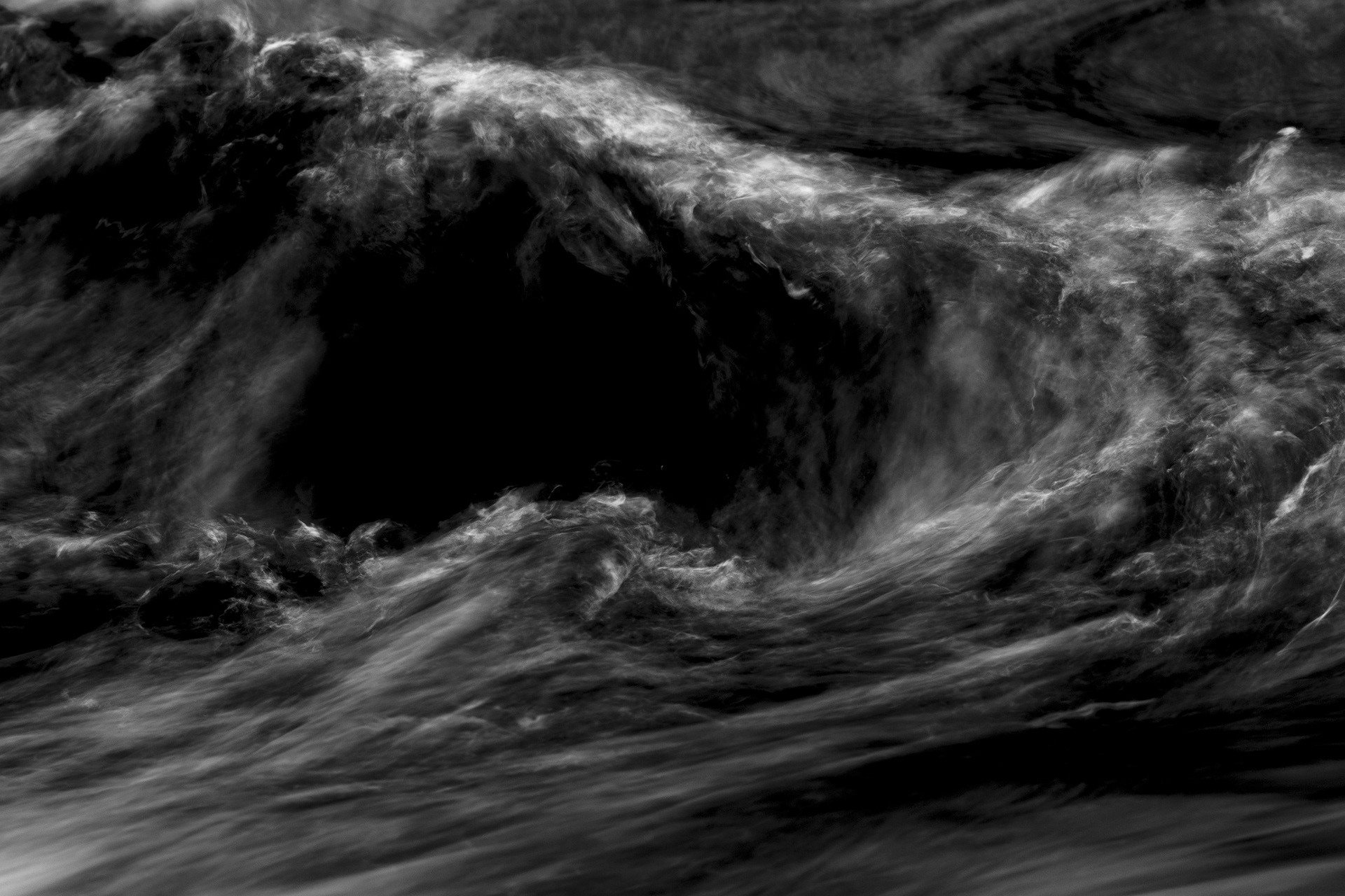 Circular water movement creating a painterly vortex. Abstract long exposure photograph by Bucchianeri.
