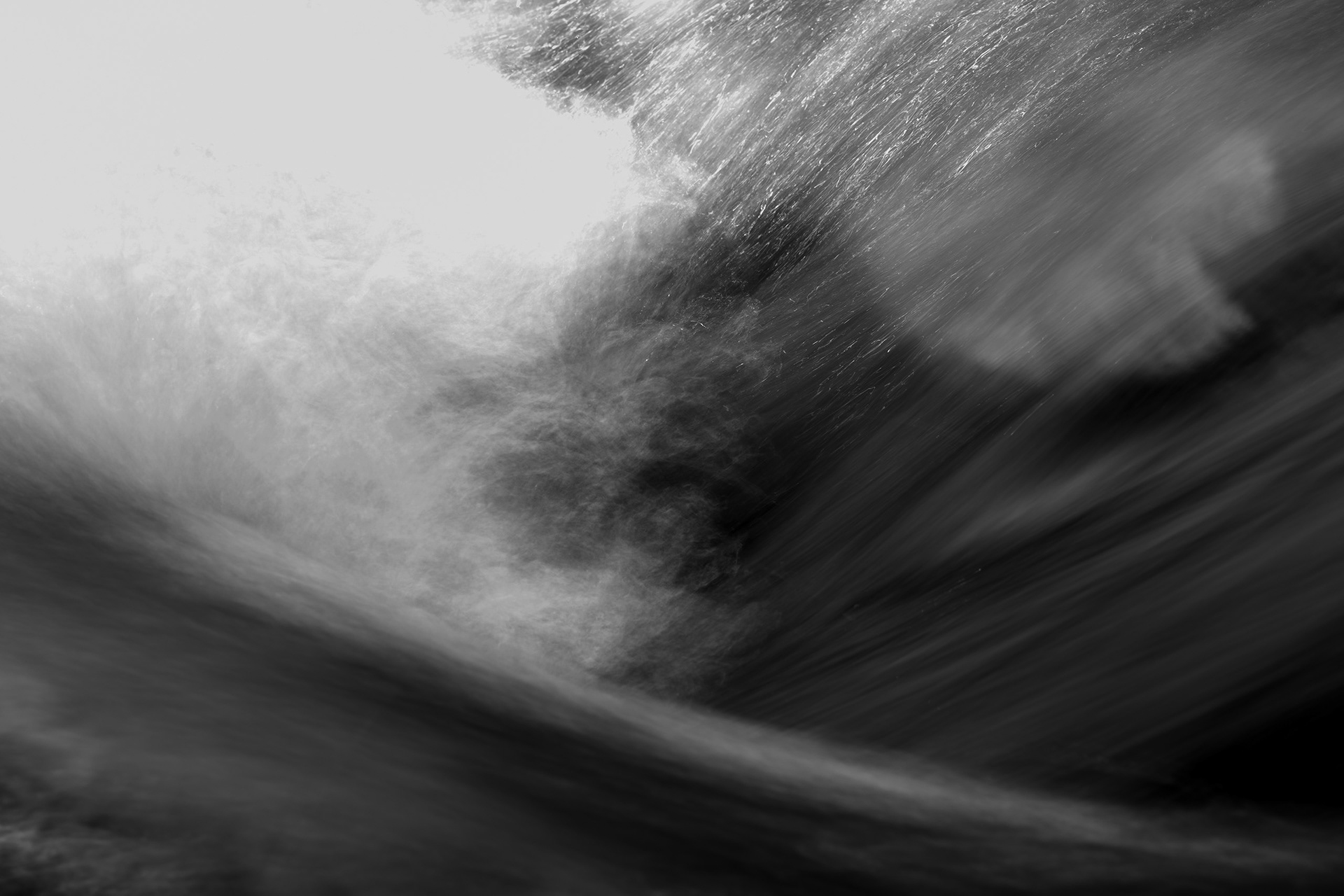 Dynamic water flow with blurred motion and tonal depth. Fine art photograph by Ryan Bucchianeri.