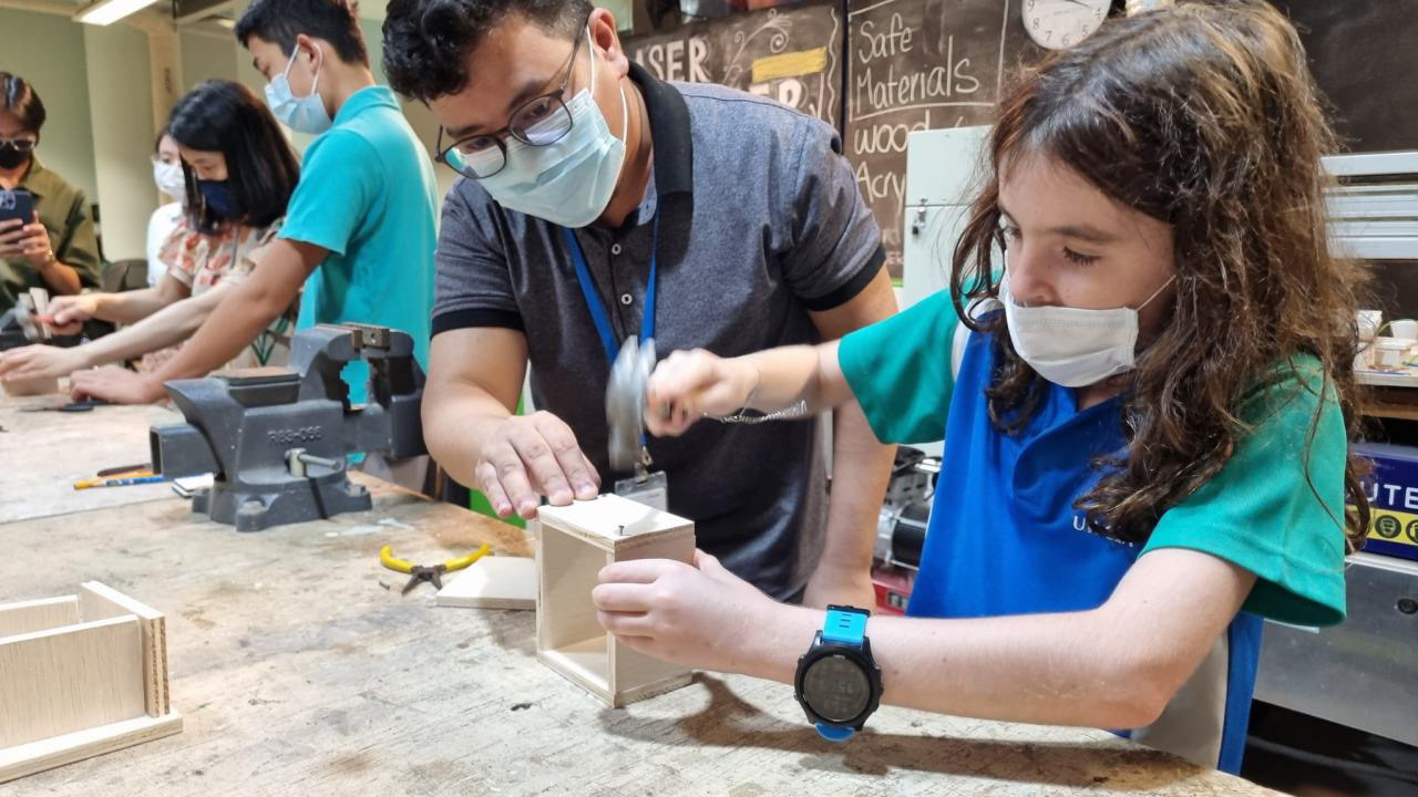 Our youngest participant handling tools!