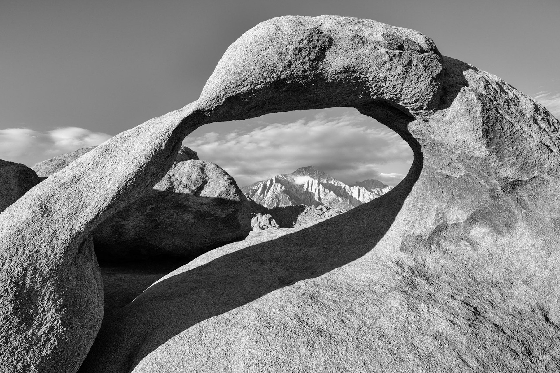 Mobius Arch, located in Alabama Hills, Death Valley National Park - with Mount Whitney in the background.