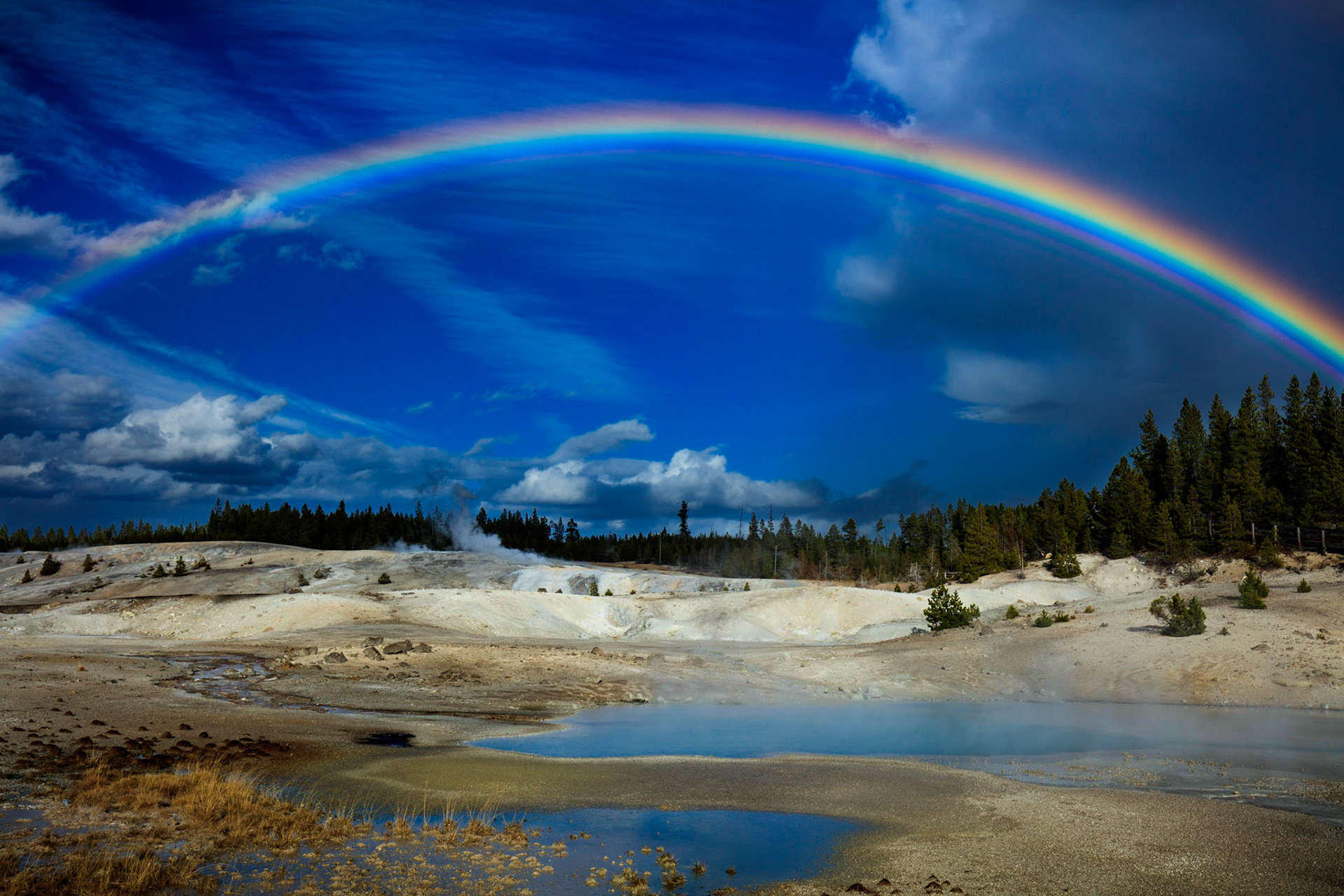 Rainbow over the Norris Geyser Basin in Yellowstone National Park.