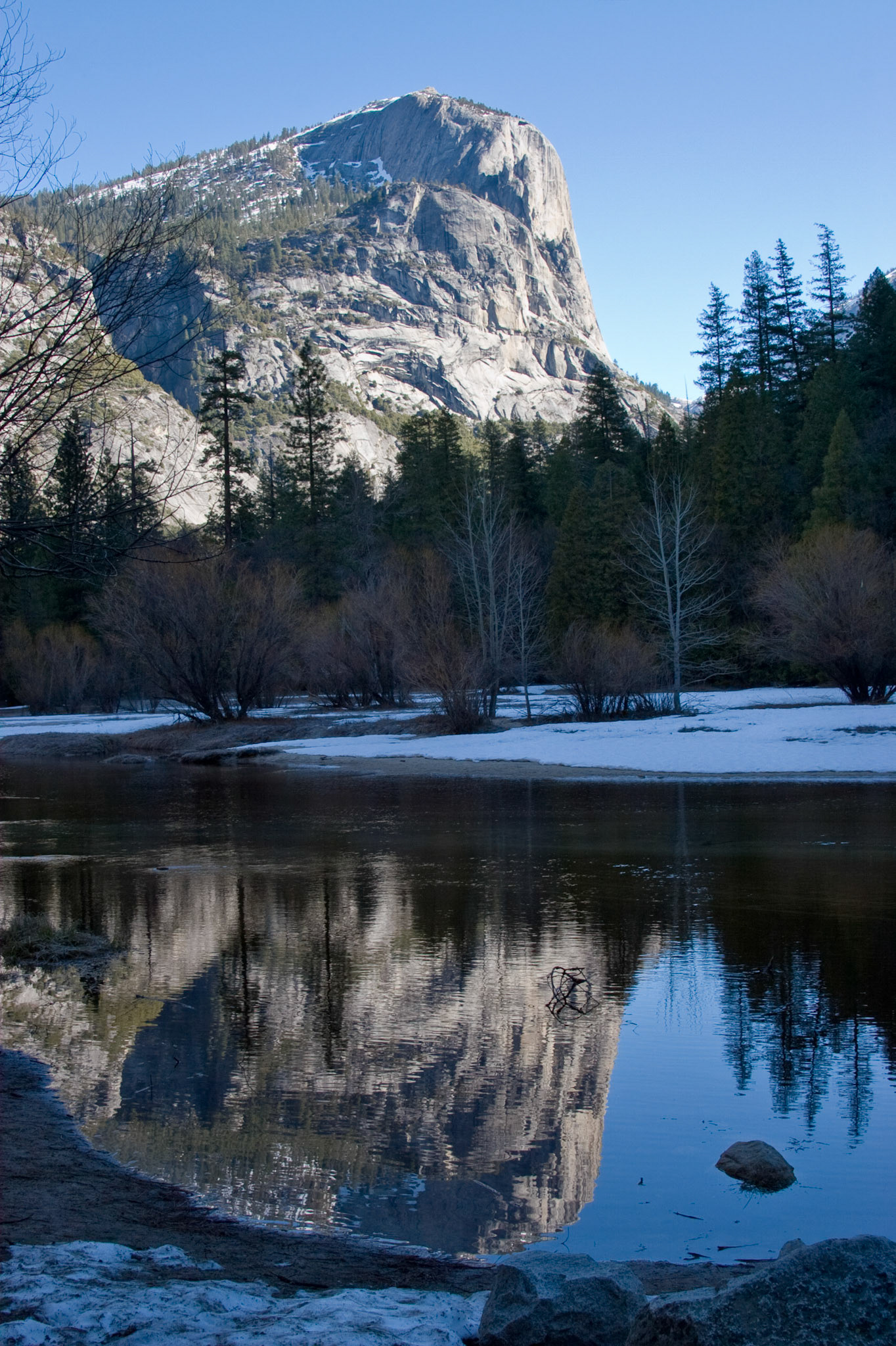 A view of Mt. Watkins reflected in Mirror Lake at Yosemite National Park in California.