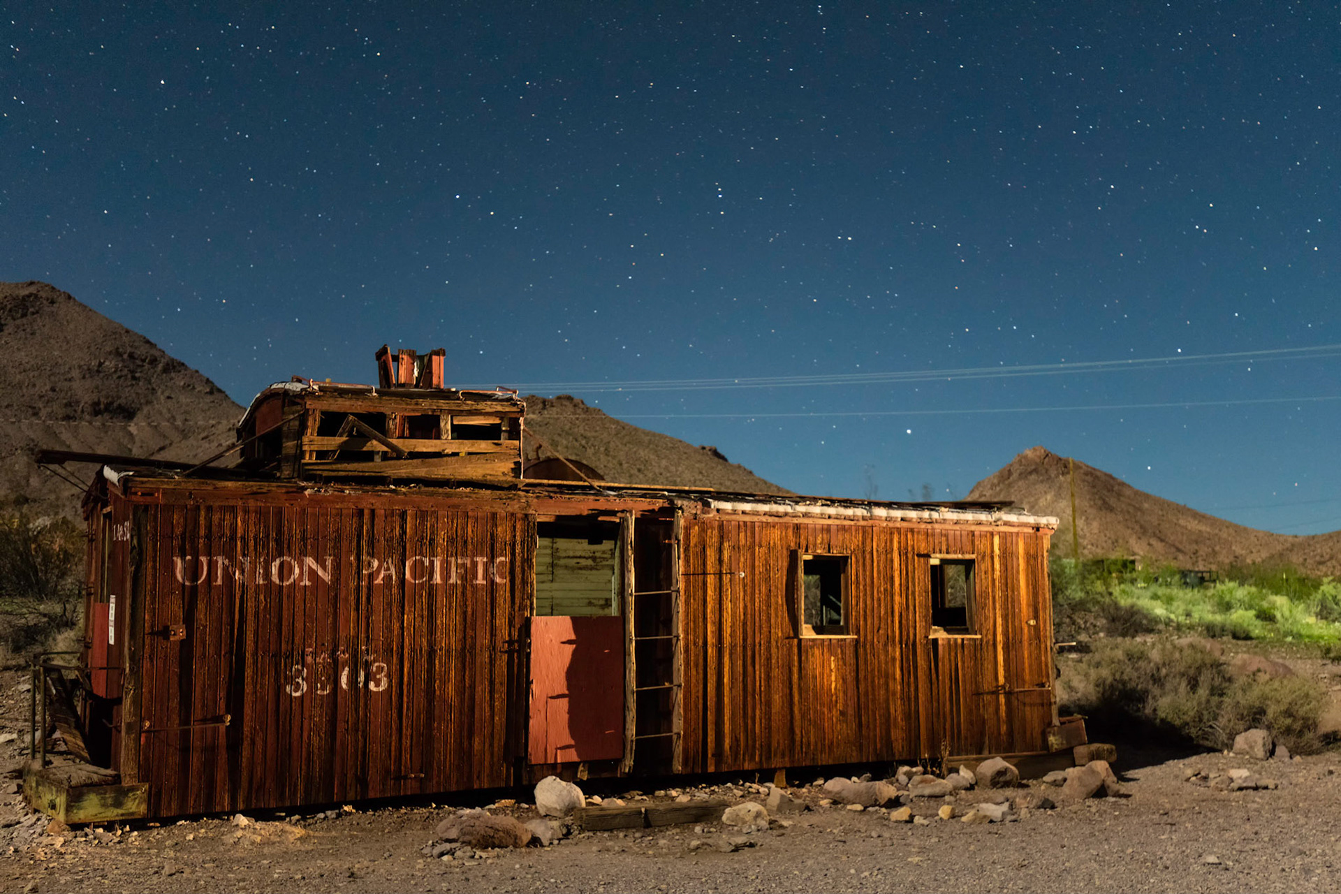 Abandoned rail car taken at night in Rhyolite Ghost Town.  The rail car was 'painted' with a flashlight from the right side.