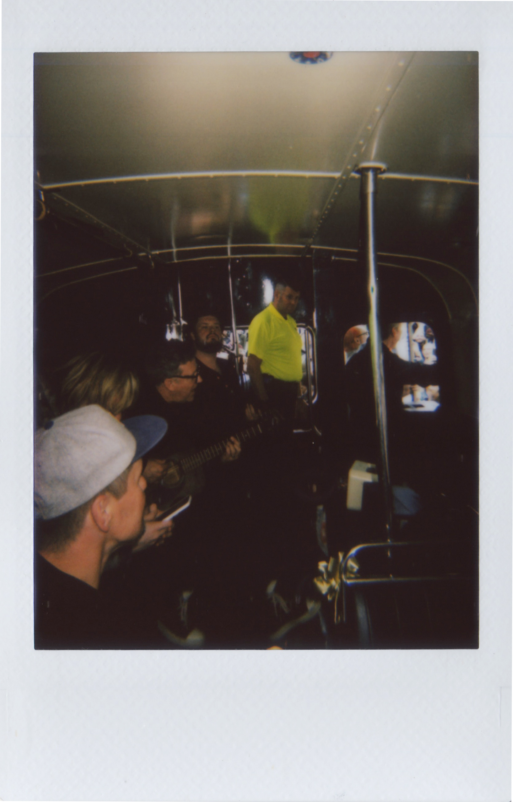Travis on a bus around Glasgow. Lomo'Instant Automat.