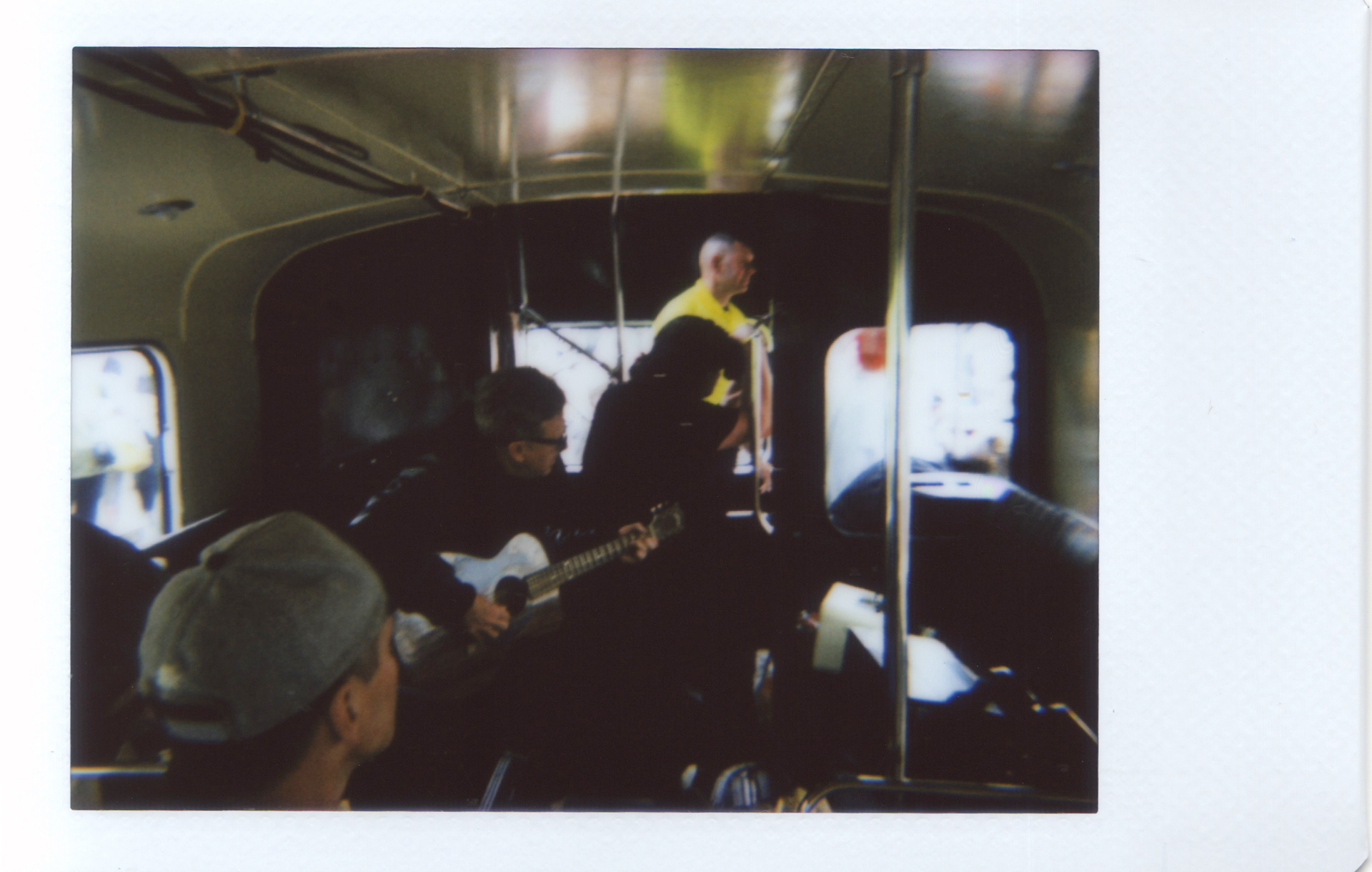 Travis on a bus around Glasgow. Lomo'Instant Automat.