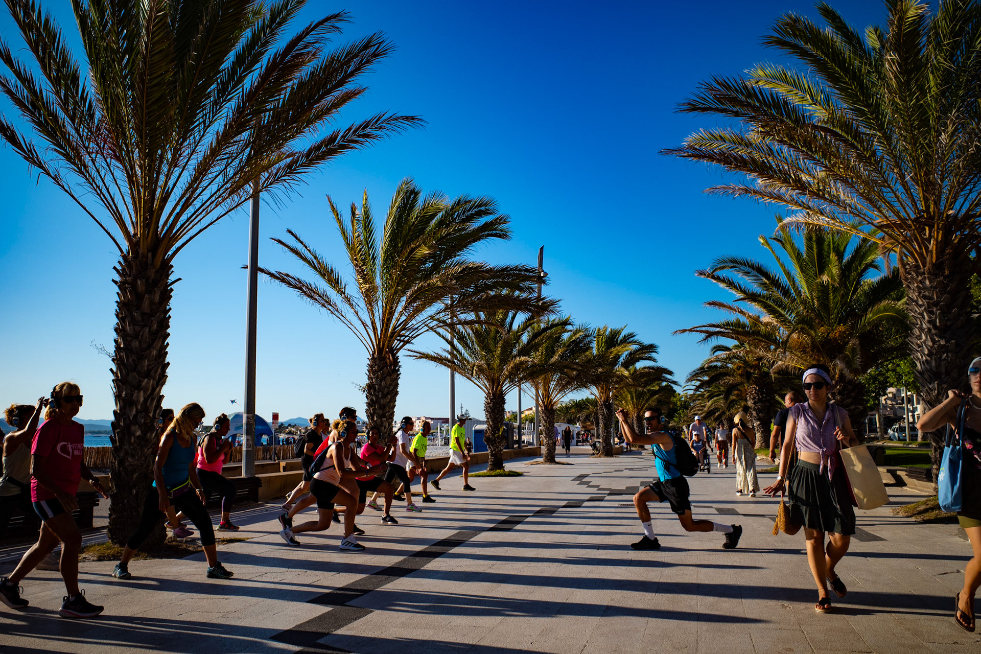 Under the palms, we move differently