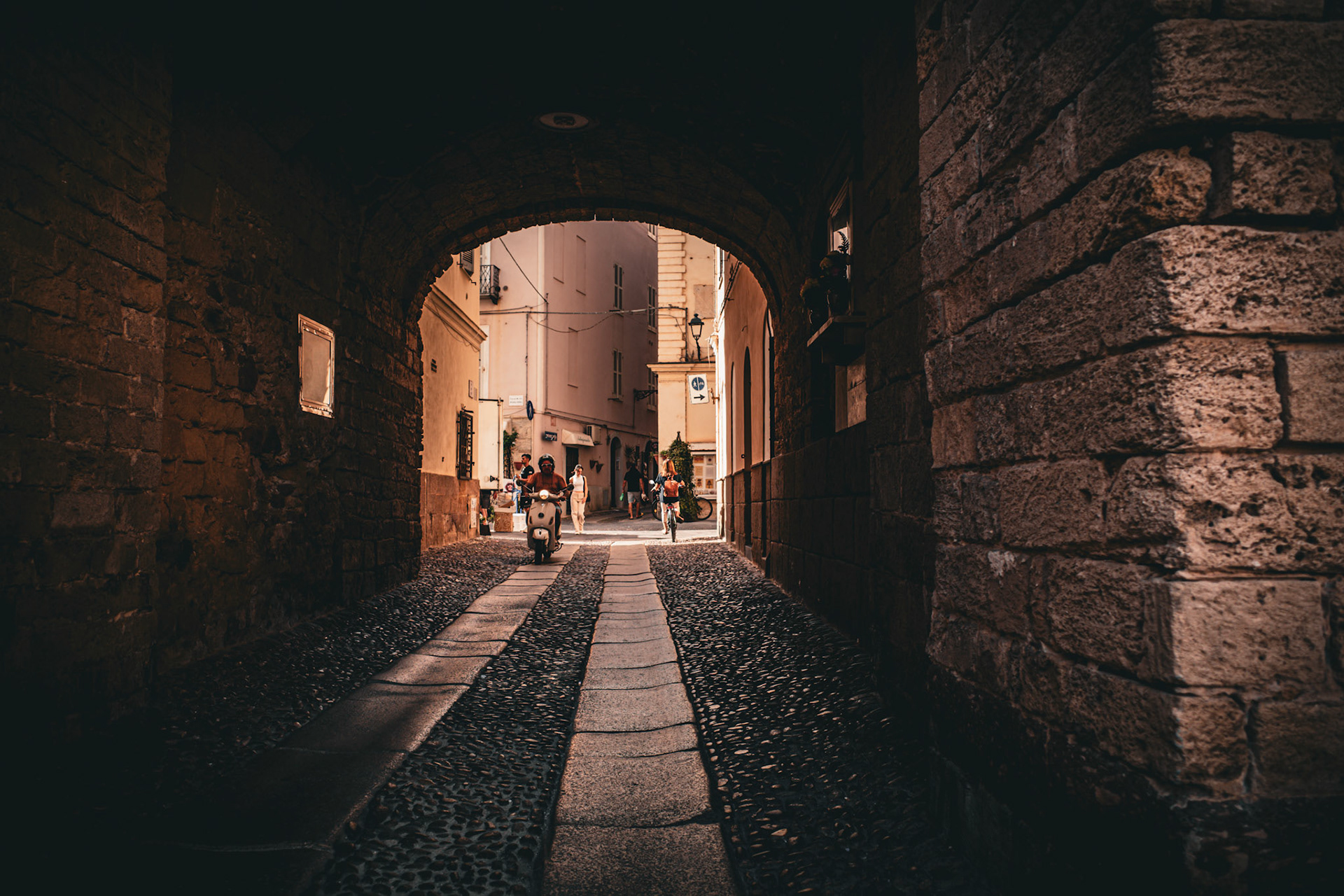 Through the arch, the day unfolds