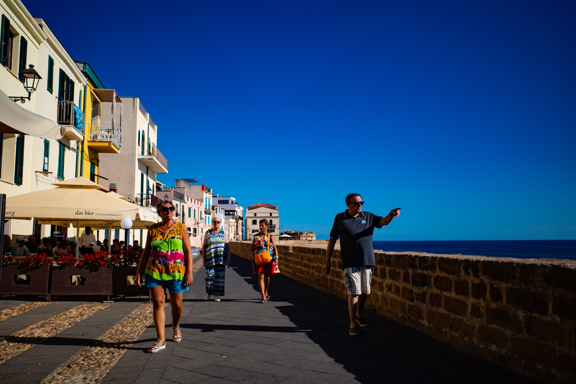 Pointing at the horizon, dressed in colors