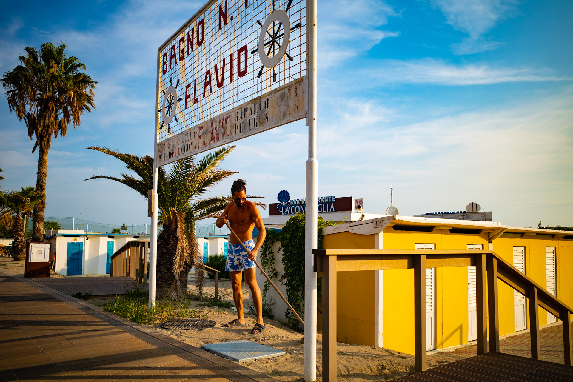 Sweeping the sunlit sand