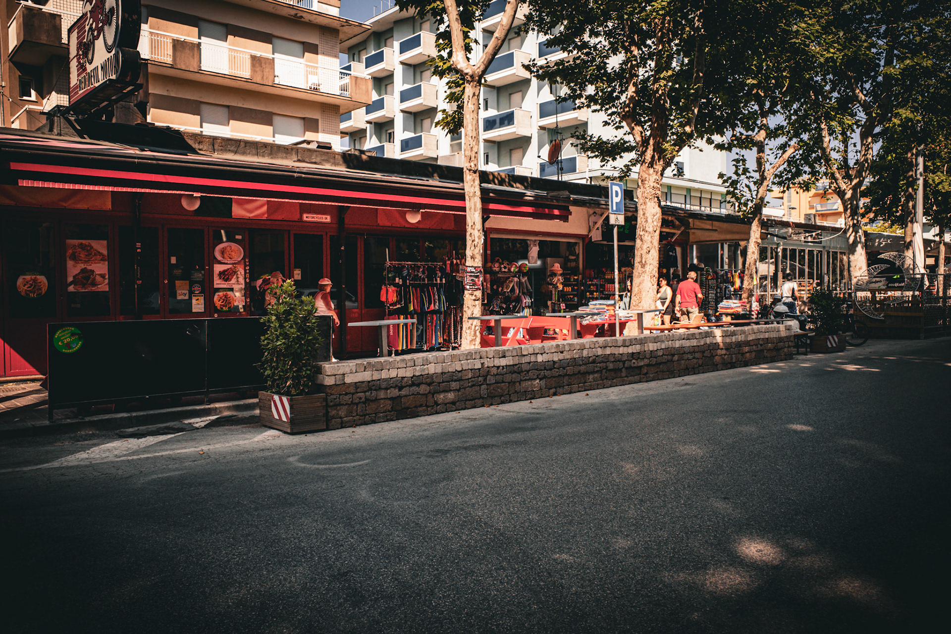 Still life with neon and straw hats