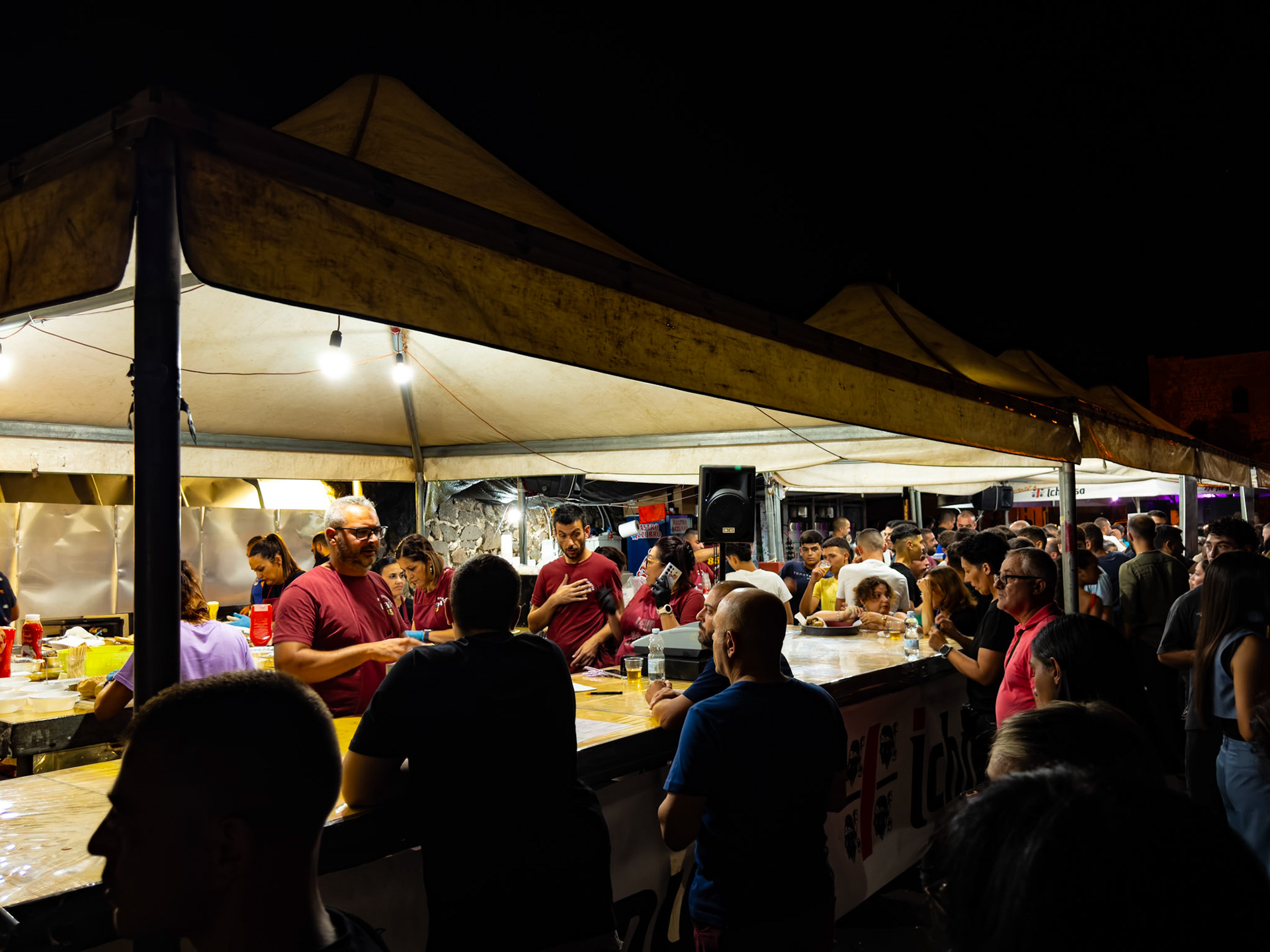 Beneath the lights of hunger and joy