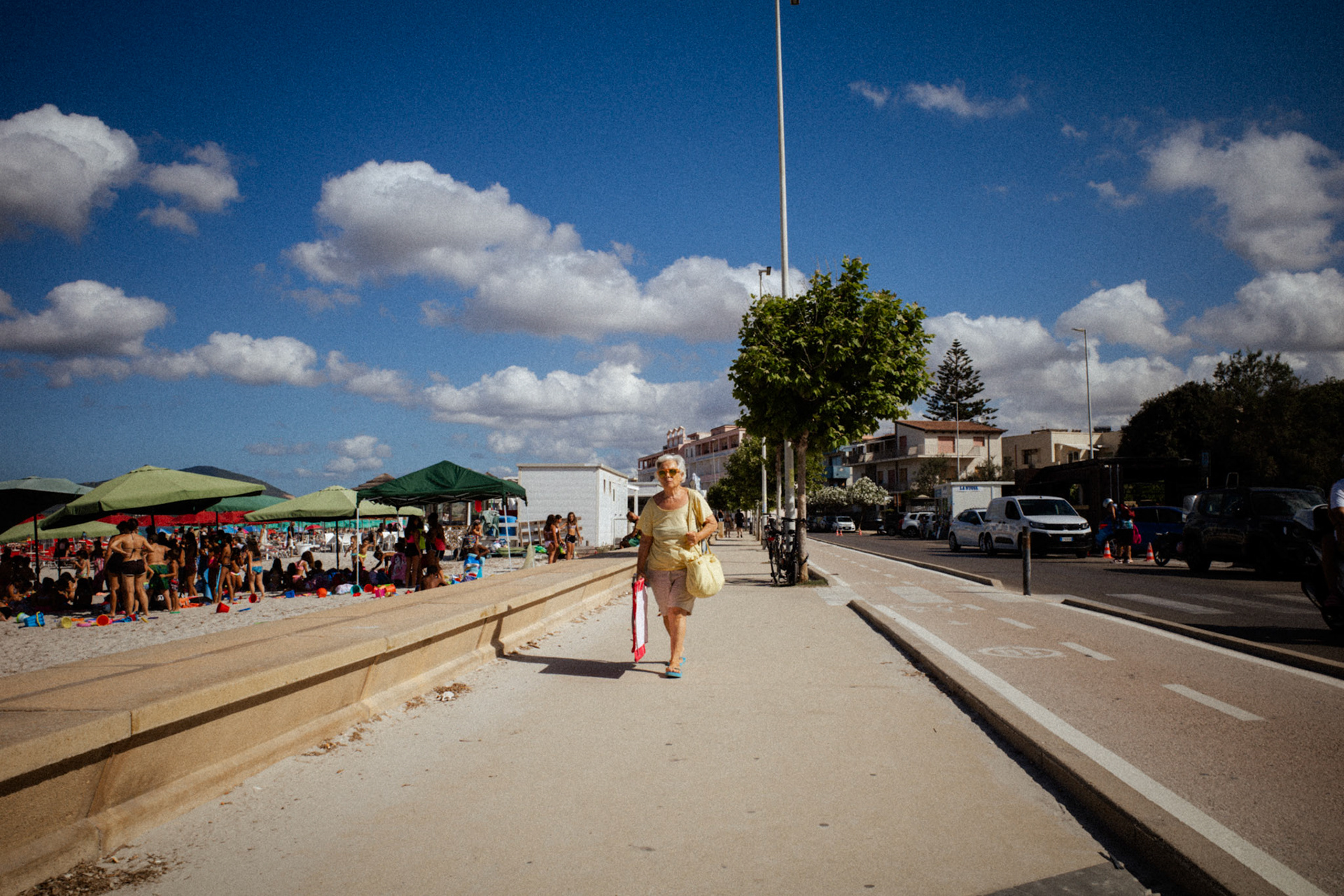 Walking between sea and asphalt