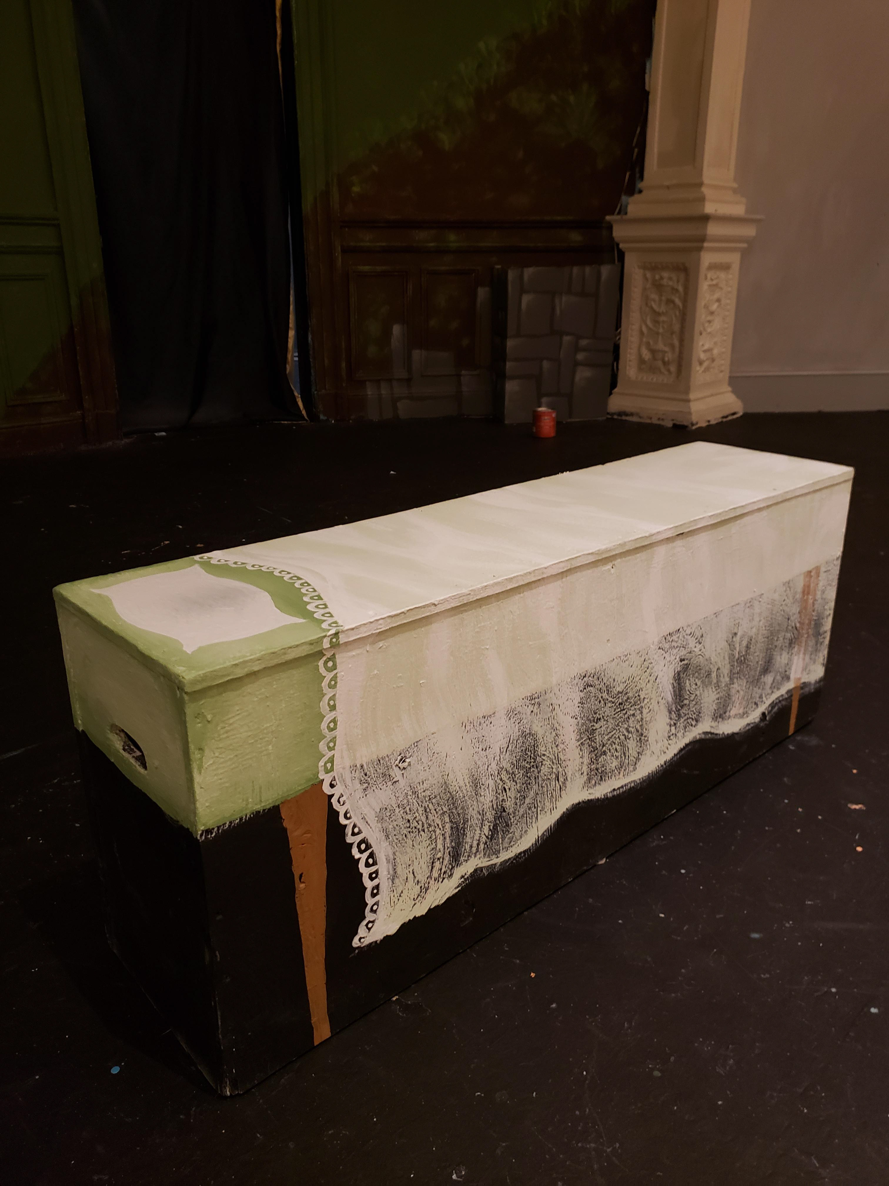 Painted bed on existing stage box to create an illusion of Fiona's bed.