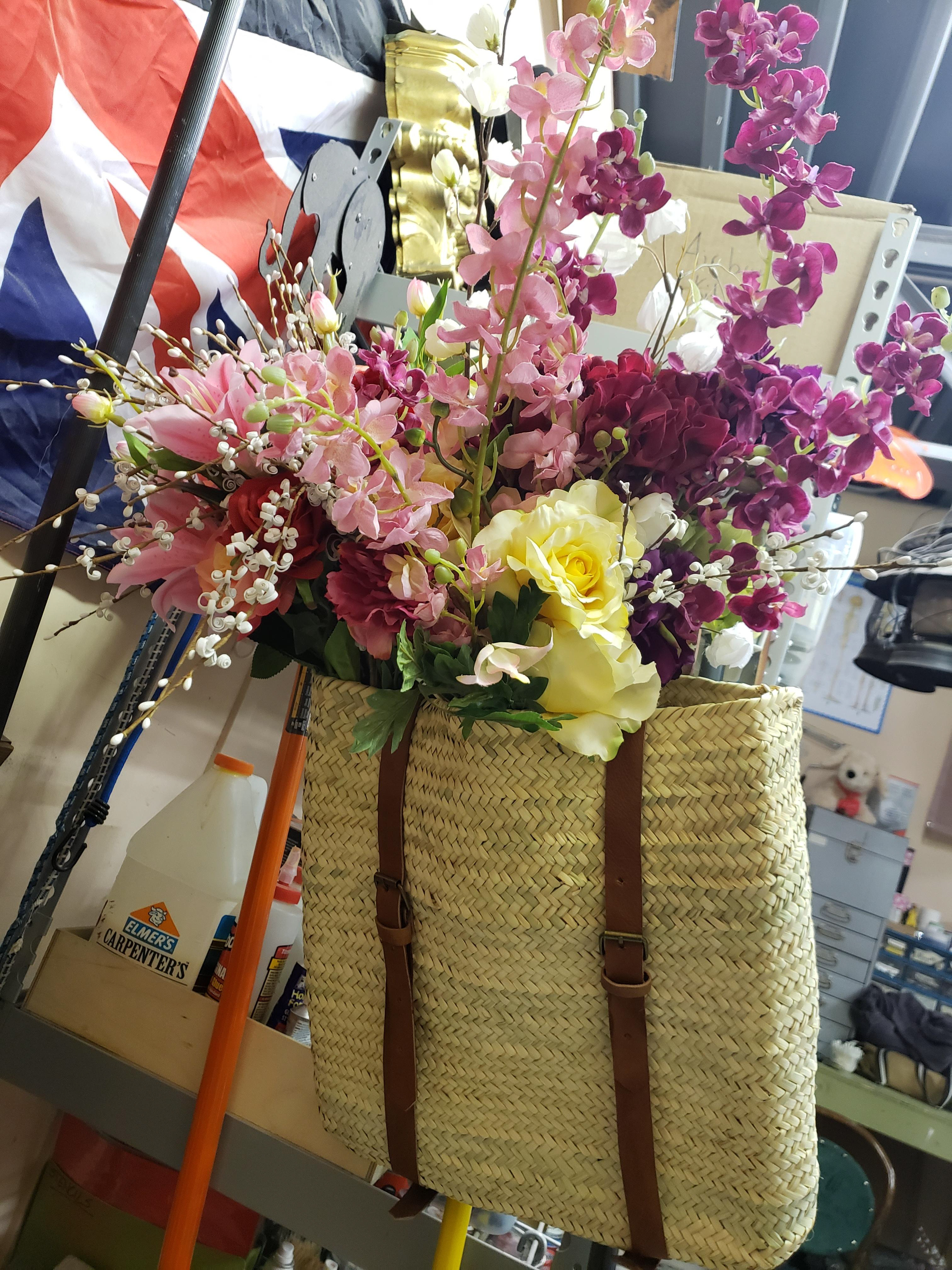 Maintained prop during runs, stuffed the bottom of the basket with towels for more volume and easier retrieval of flowers.