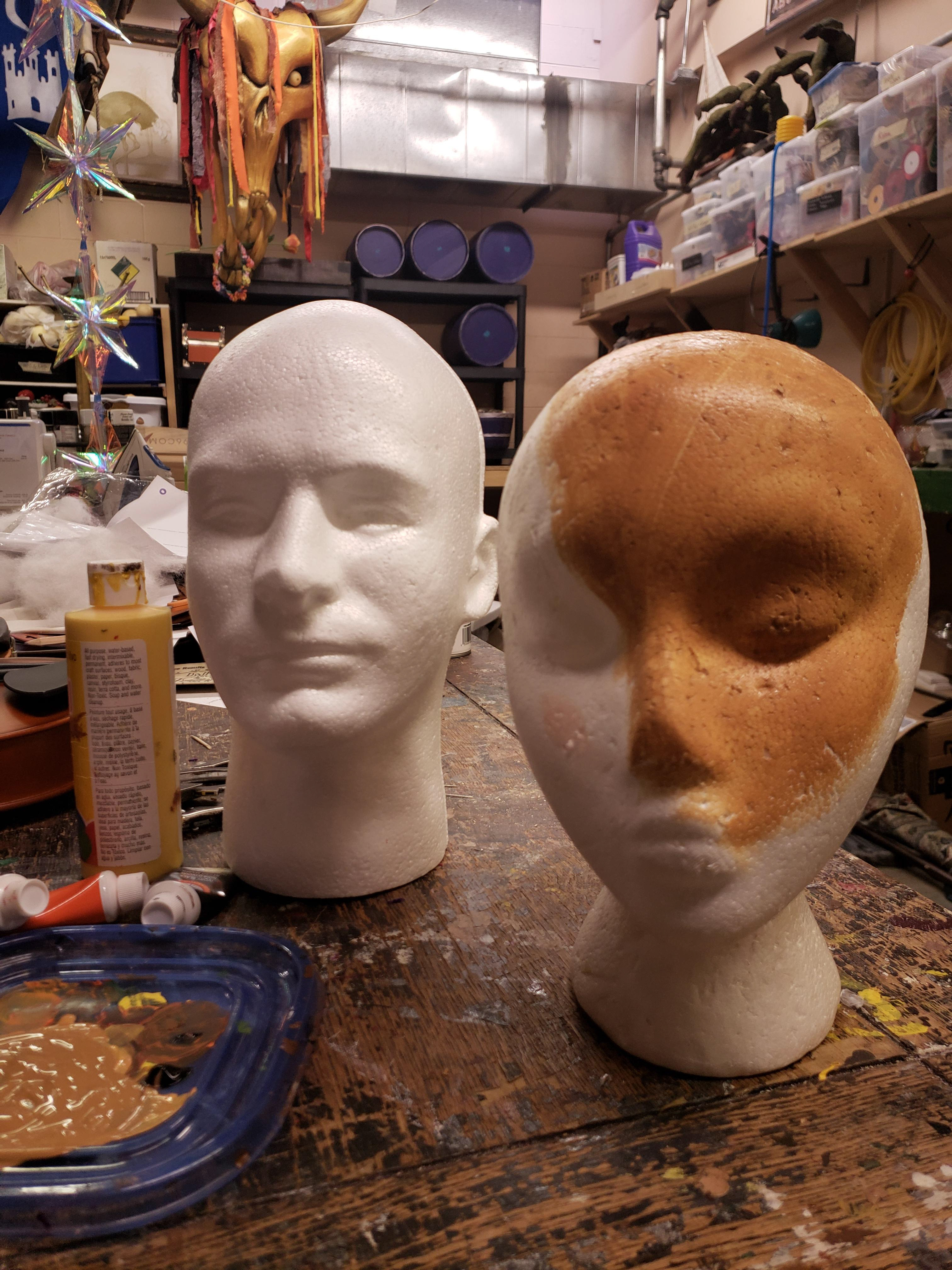 Painted wig mannequin heads to match mannequin body.