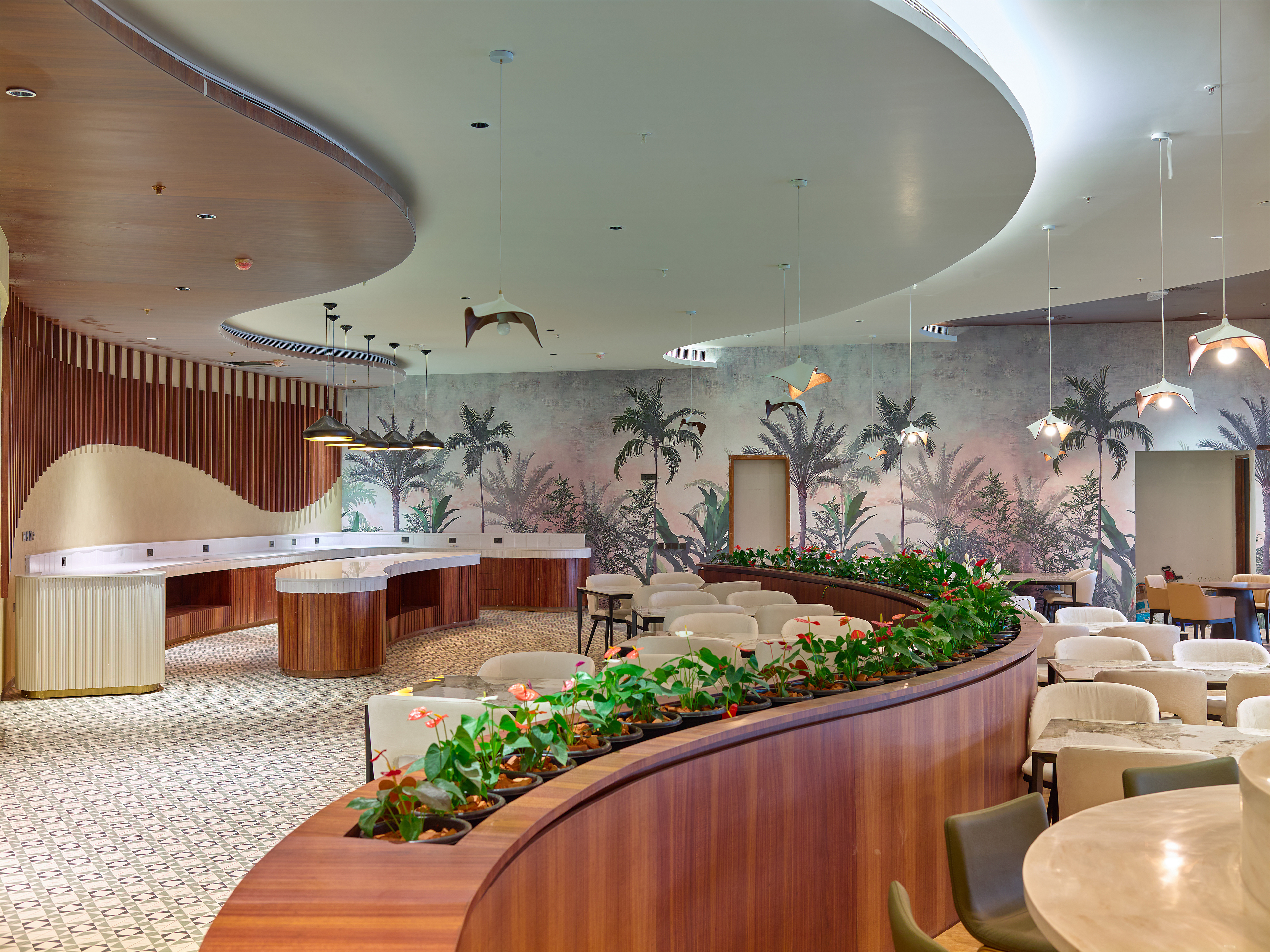 Stylish restaurant in the '0484' lounge at Cochin International Airport Ltd (CIAL), showcasing elegant decor, cozy seating, and a premium dining experience, photographed by Oamkumar Thottungal.