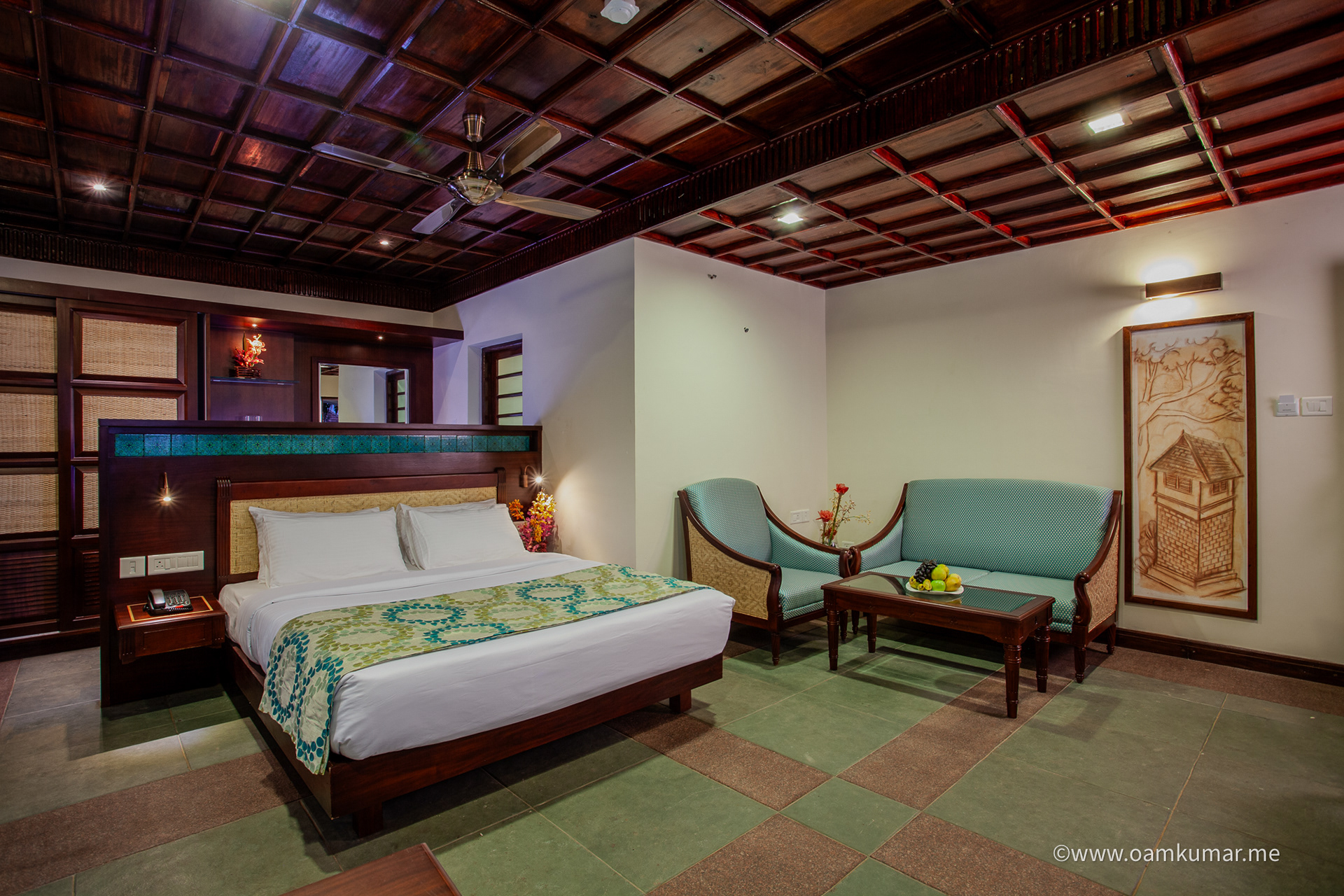 Room interior of Indriya Resort , Cherai – photographed by Oamkumar using a blend of natural light, ambient room lighting, and artificial lighting for balanced exposure