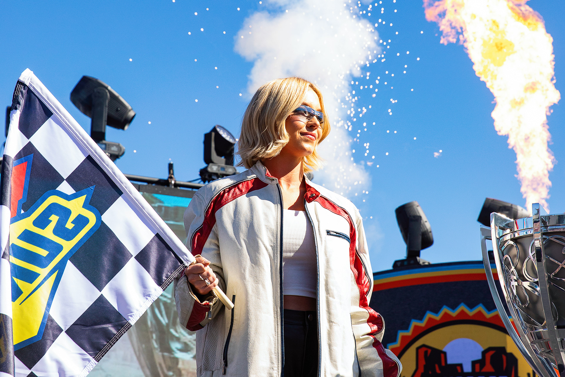 Actress Sydney Sweeney raises the race flag before the NASCAR Cup Series Championship Race at Phoenix Raceway, Nov. 2. 