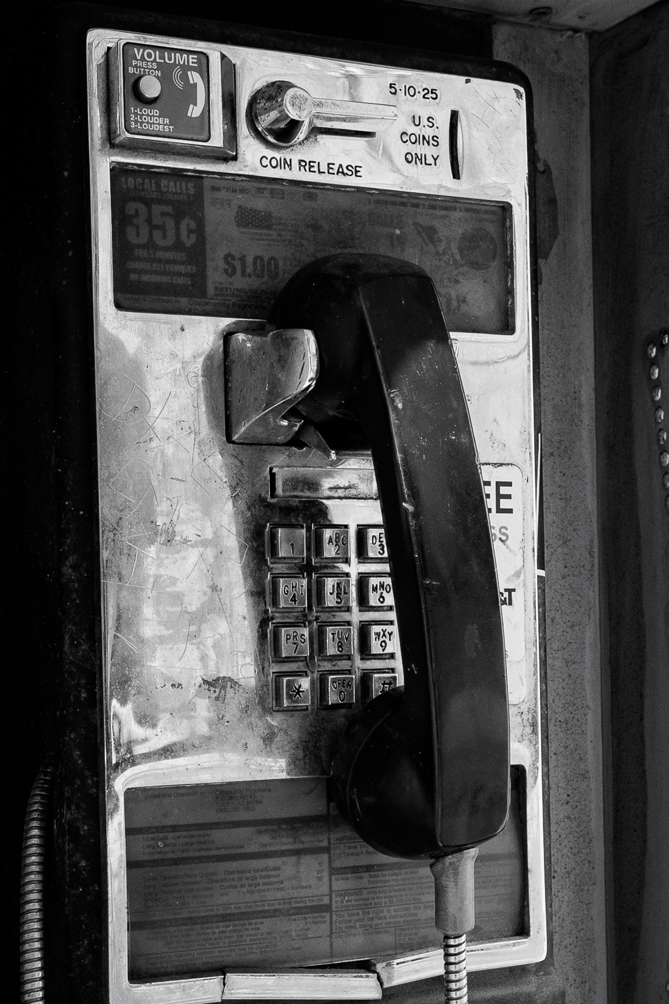 A landline in an alley in downtown Flagstaff. One of the things that I really love to do is play around with super wide lenses and see what they would look like when you can use your legs to get closer to your subject. And by getting closer to this landline, it really made it funky when looking at the distortion that it did for the phone. I loved the tones and texture that I was able to get out of the numbers as well of the phone itself. Taken on the Sigma 20mm f/1.4 Art lens. March 13, 2026. 
