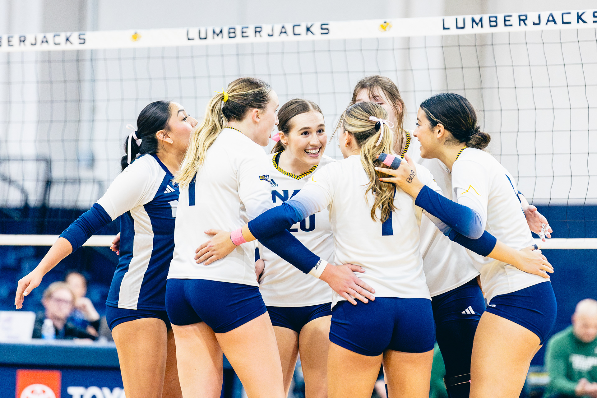 The NAU Volleyball team celebrates after winning the 3rd set during the Big Sky Conference game against Portland State at the Rolle Activity Center, Oct. 9. 