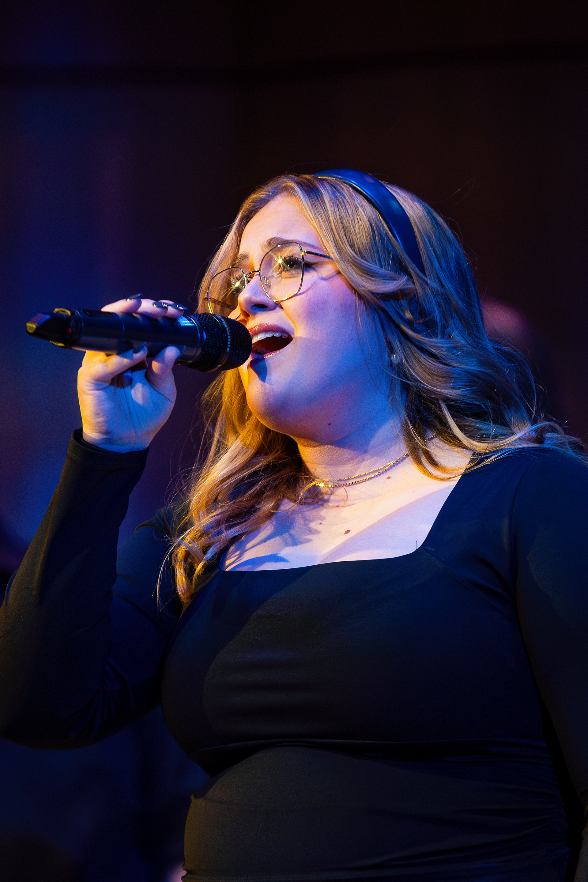 Freshman Rylie Rafferty sings a solo during The High Altitude Vocal Jazz Ensemble's set during the Fall Festival of Choirs in Kitt Recital Hall, Nov, 1. 