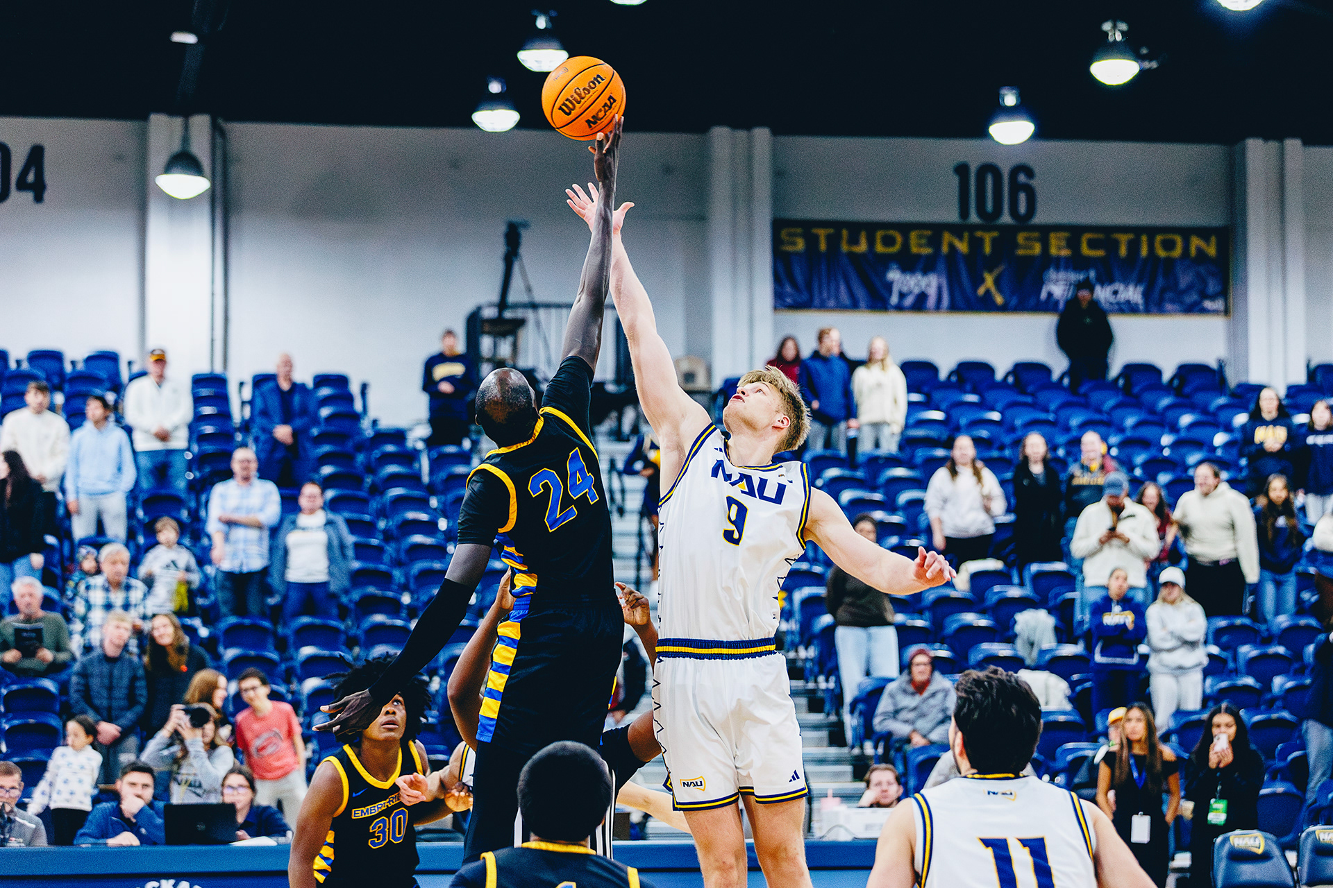 Sophomore forward Karl Poom (9) wins the tip off during the non-conference game against Embry Riddle at The Rolle Activity Center. Nov. 18. 