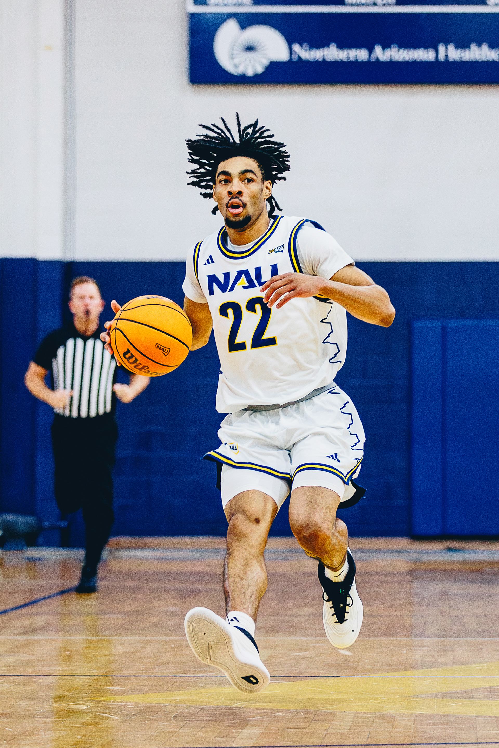 Sophomore guard Kavon Bradford (22) dribbles the ball down the court during the non-conference game against Embry Riddle at The Rolle Activity Center. Nov. 18. 