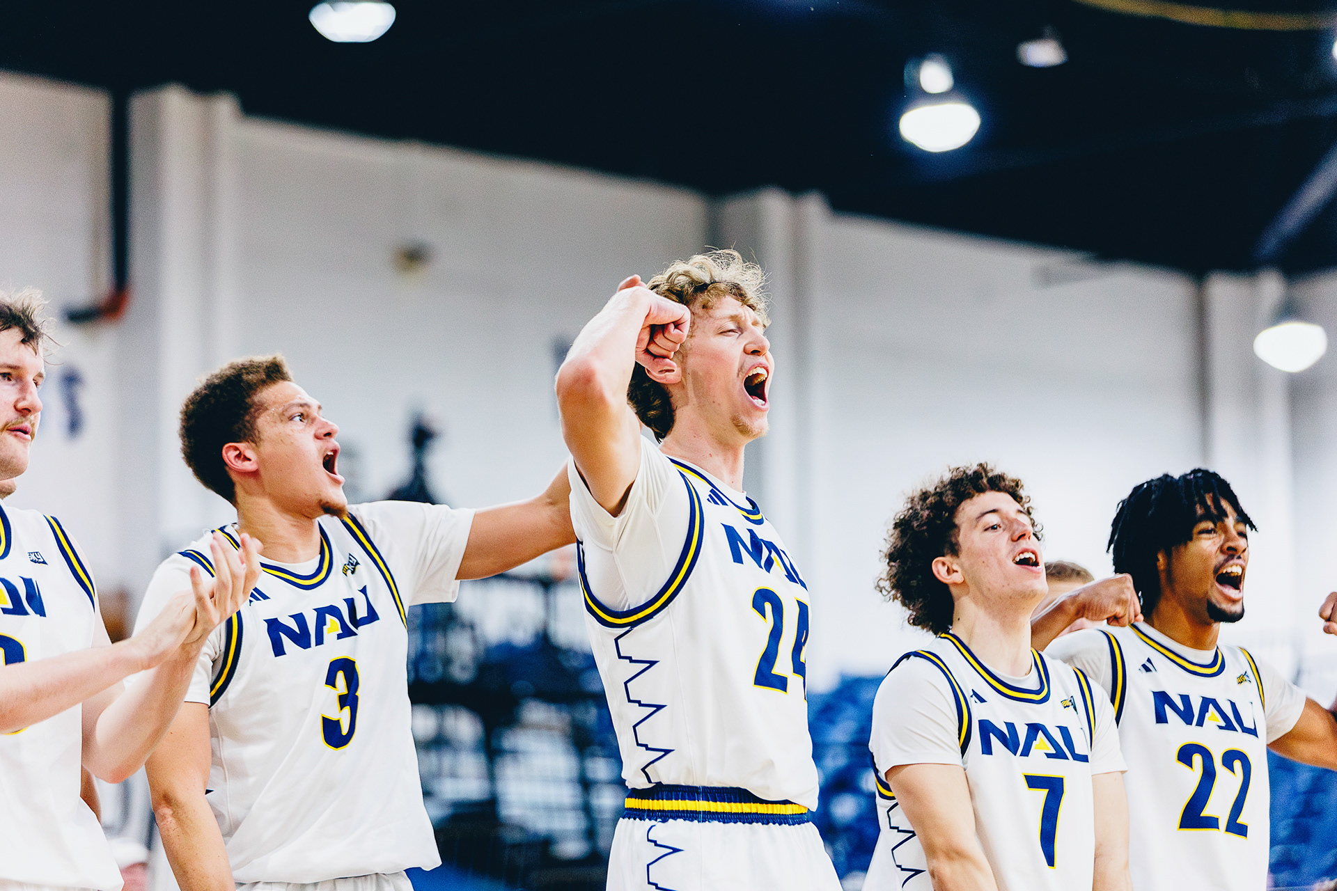 The NAU men's basketball team celebrates a made three point shot during the non-conference game against Embry Riddle at The Rolle Activity Center. Nov. 9. 