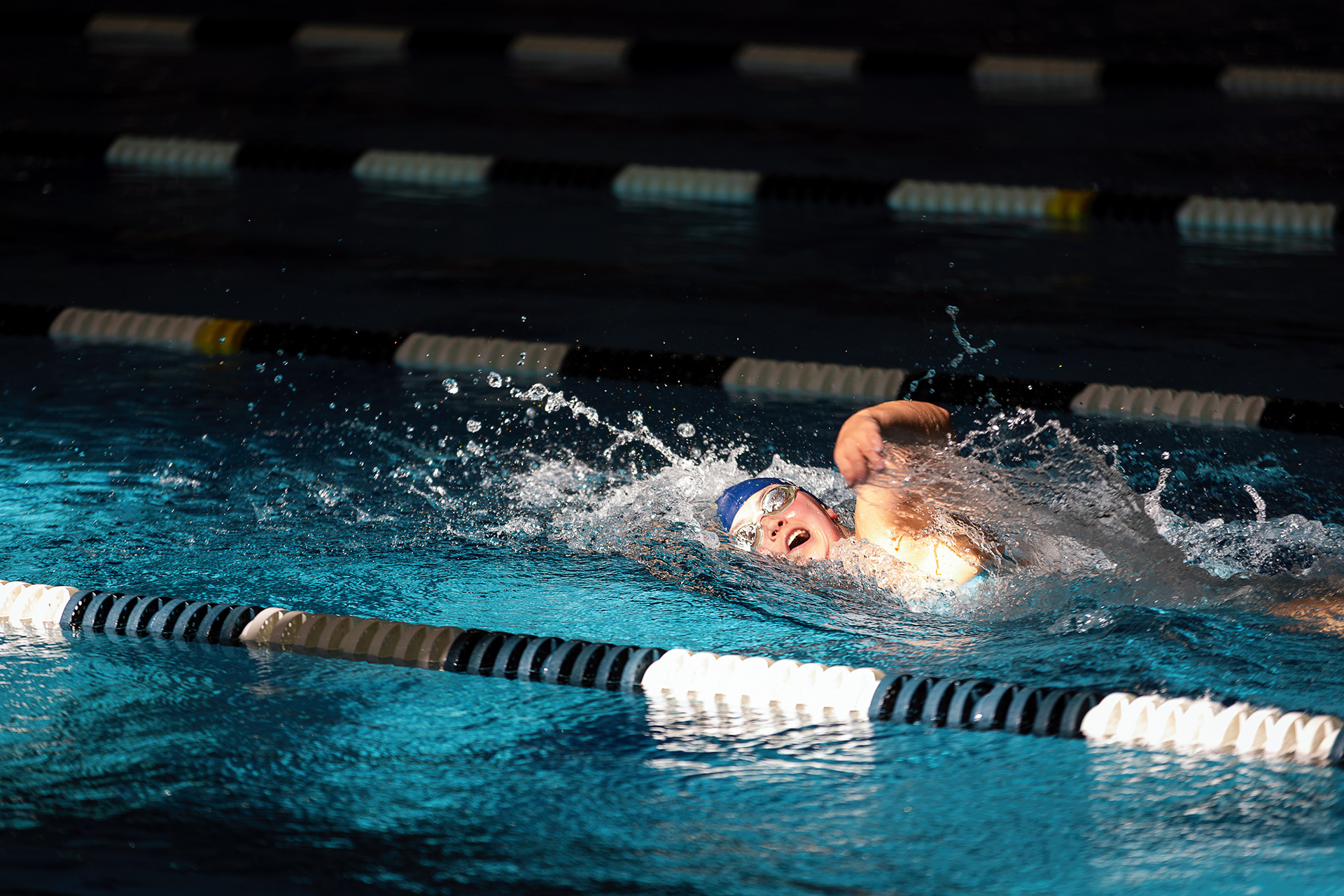 An NAU swimmer swims the 300m freestyle during the meet against New Mexico State at the Wall Aquatic Center, Nov. 7.  